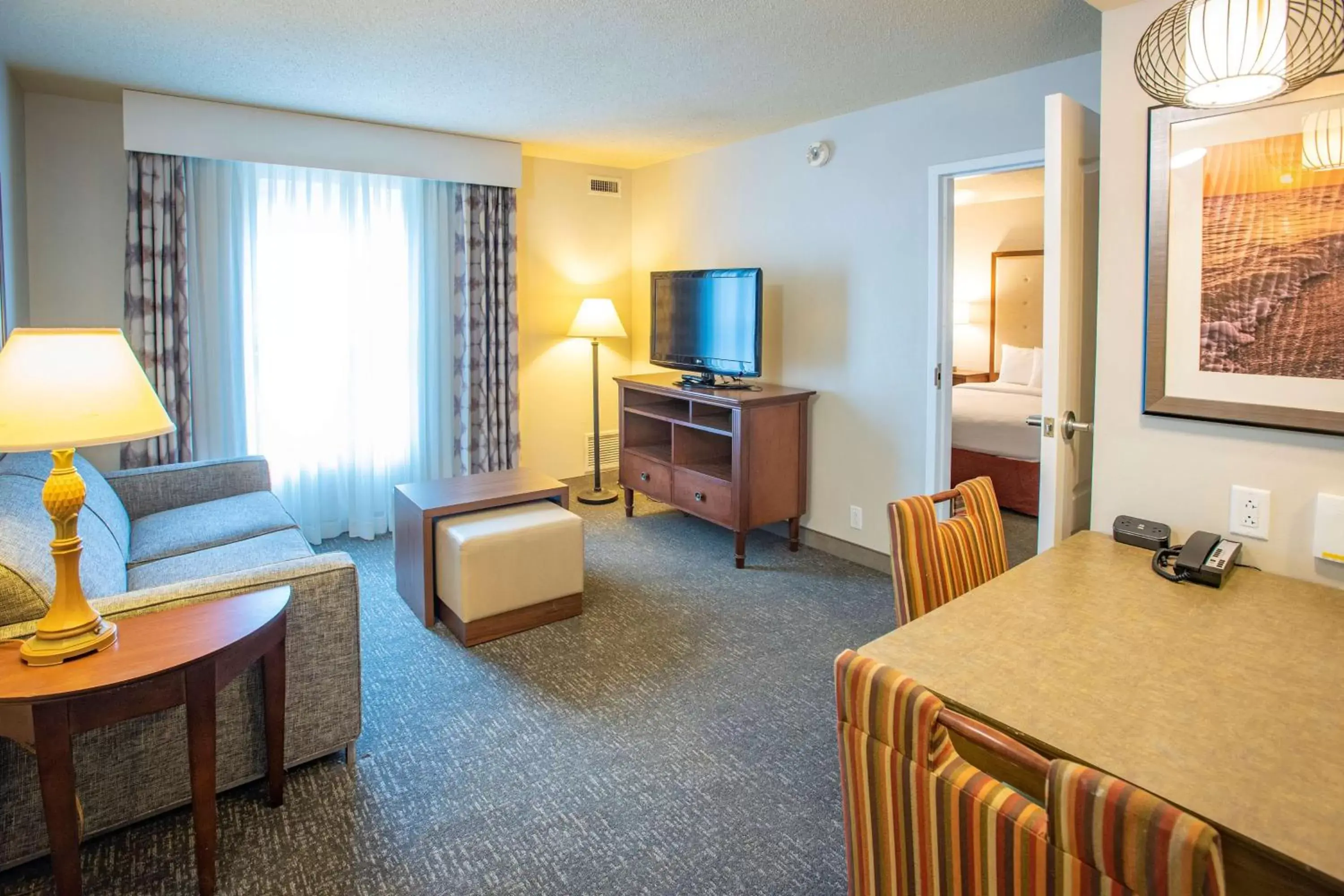 Living room, TV/Entertainment Center in Homewood Suites by Hilton Pensacola Airport-Cordova Mall Area