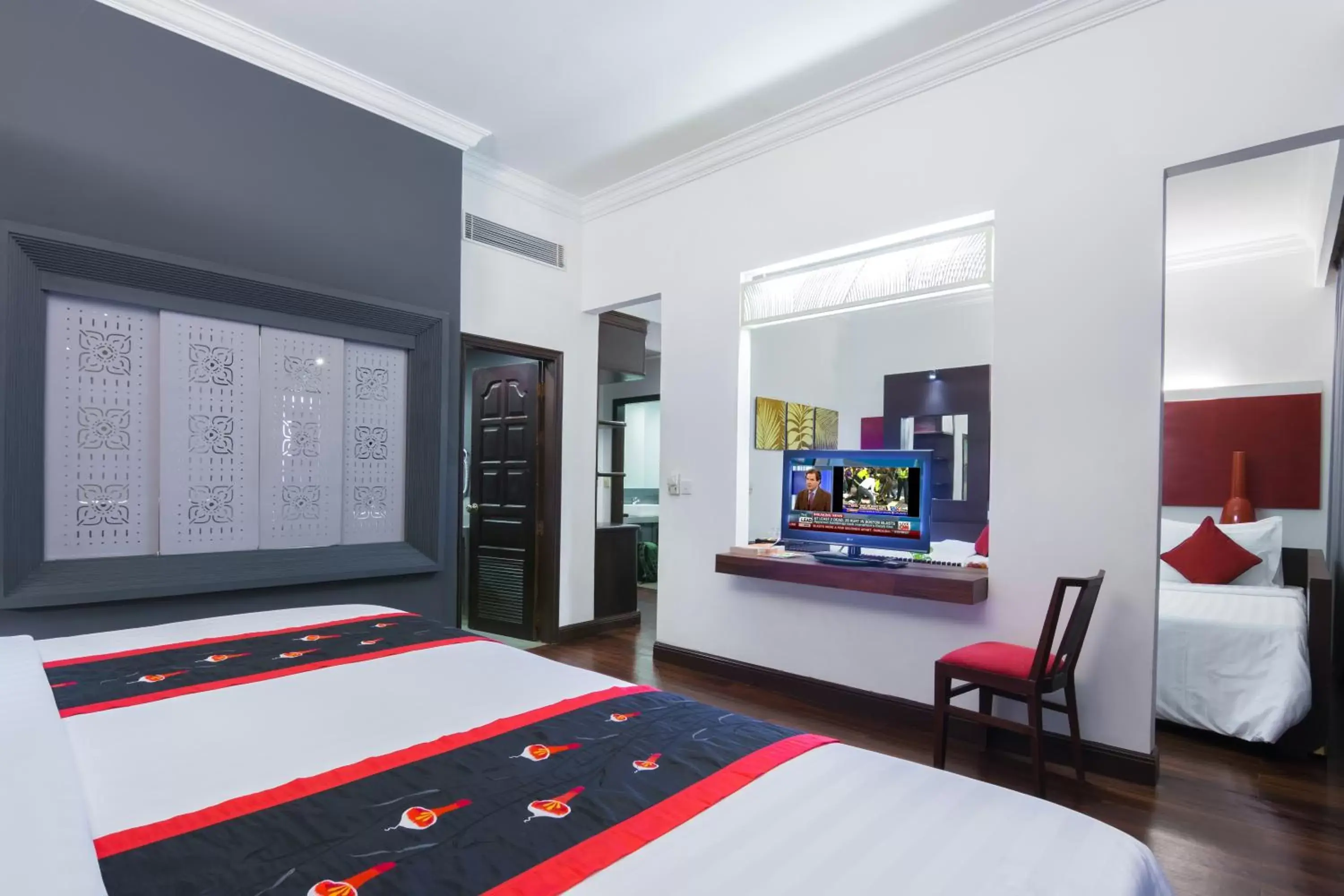 Text overlay, TV/Entertainment Center in Memoire d' Angkor Boutique Hotel