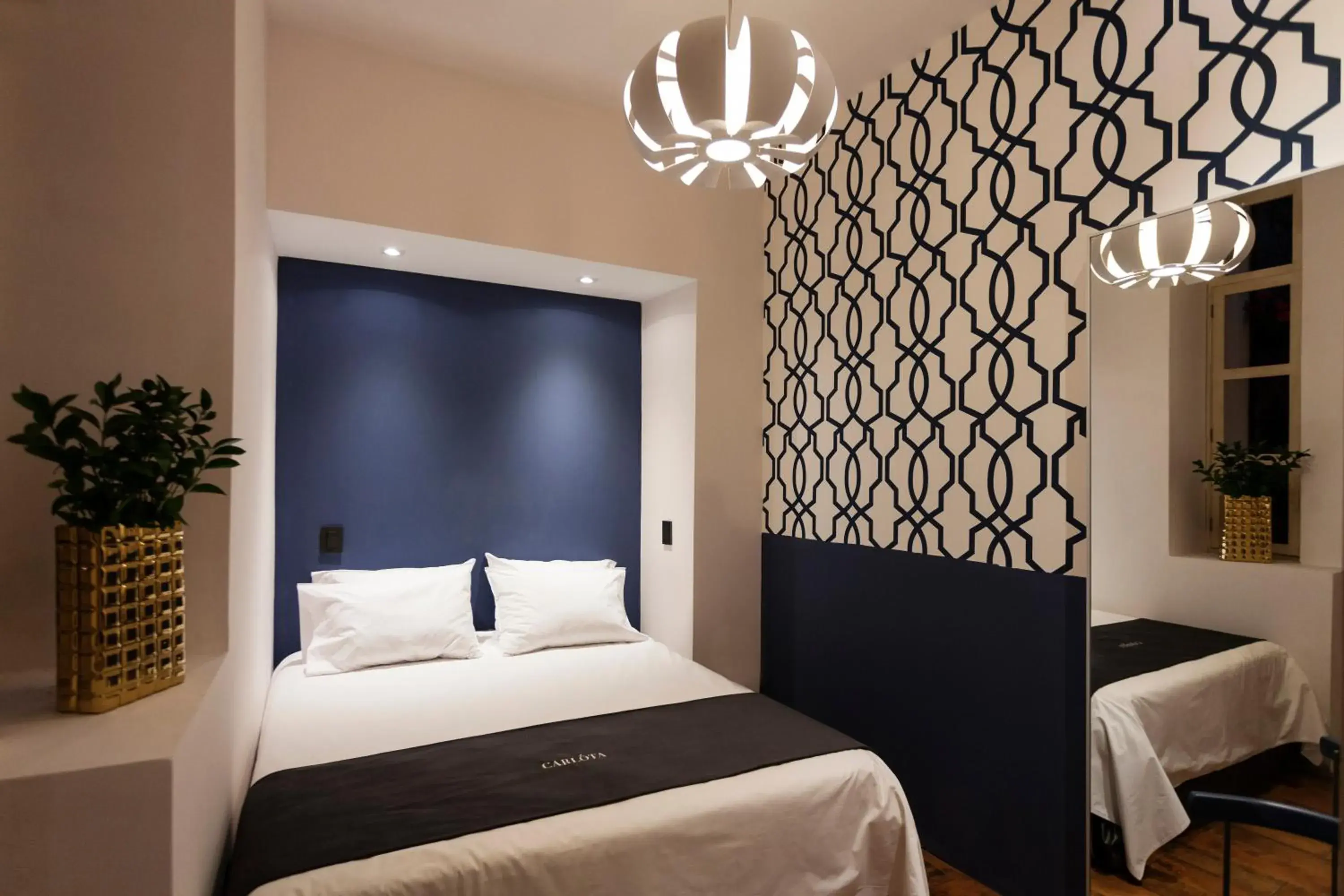 Bed in Carlota Sustainable Design Hotel