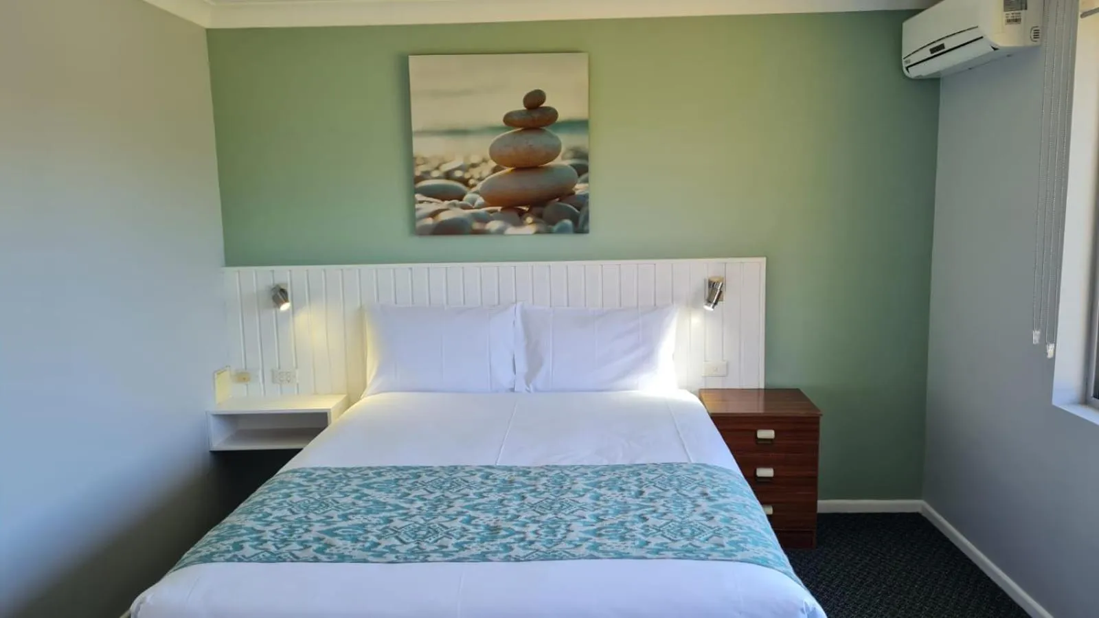 Bed in Marco Polo Motor Inn Taree