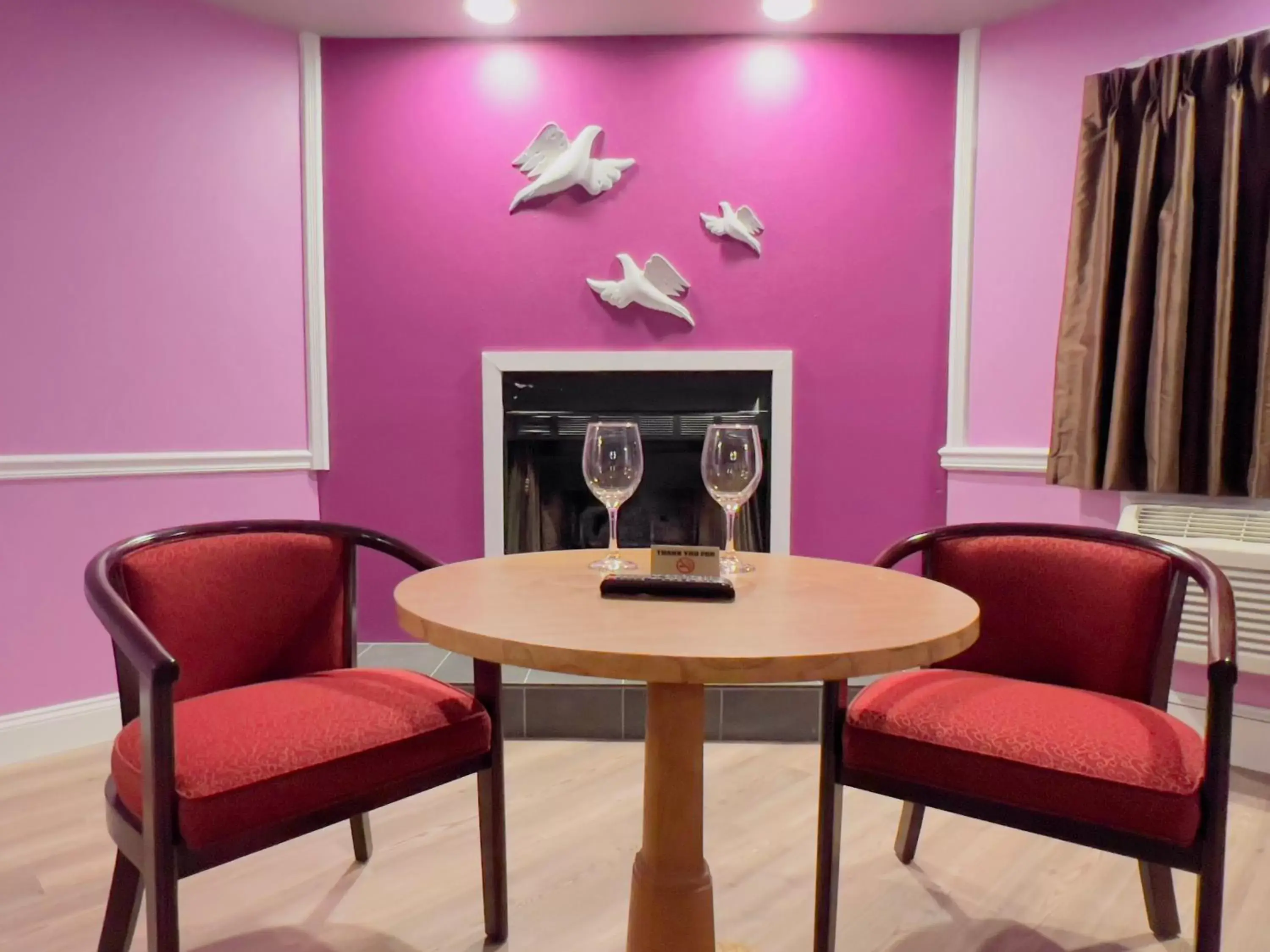 flat iron, Seating Area in Inn of the Dove Romantic Luxury Suites with Jacuzzi & Fireplace at Harrisburg-Hershey, PA