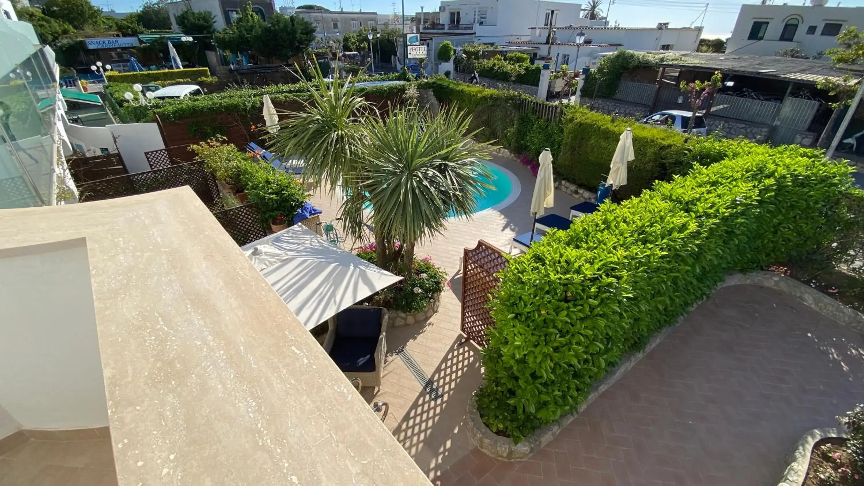 Balcony/Terrace, Pool View in Hotel Bougainville