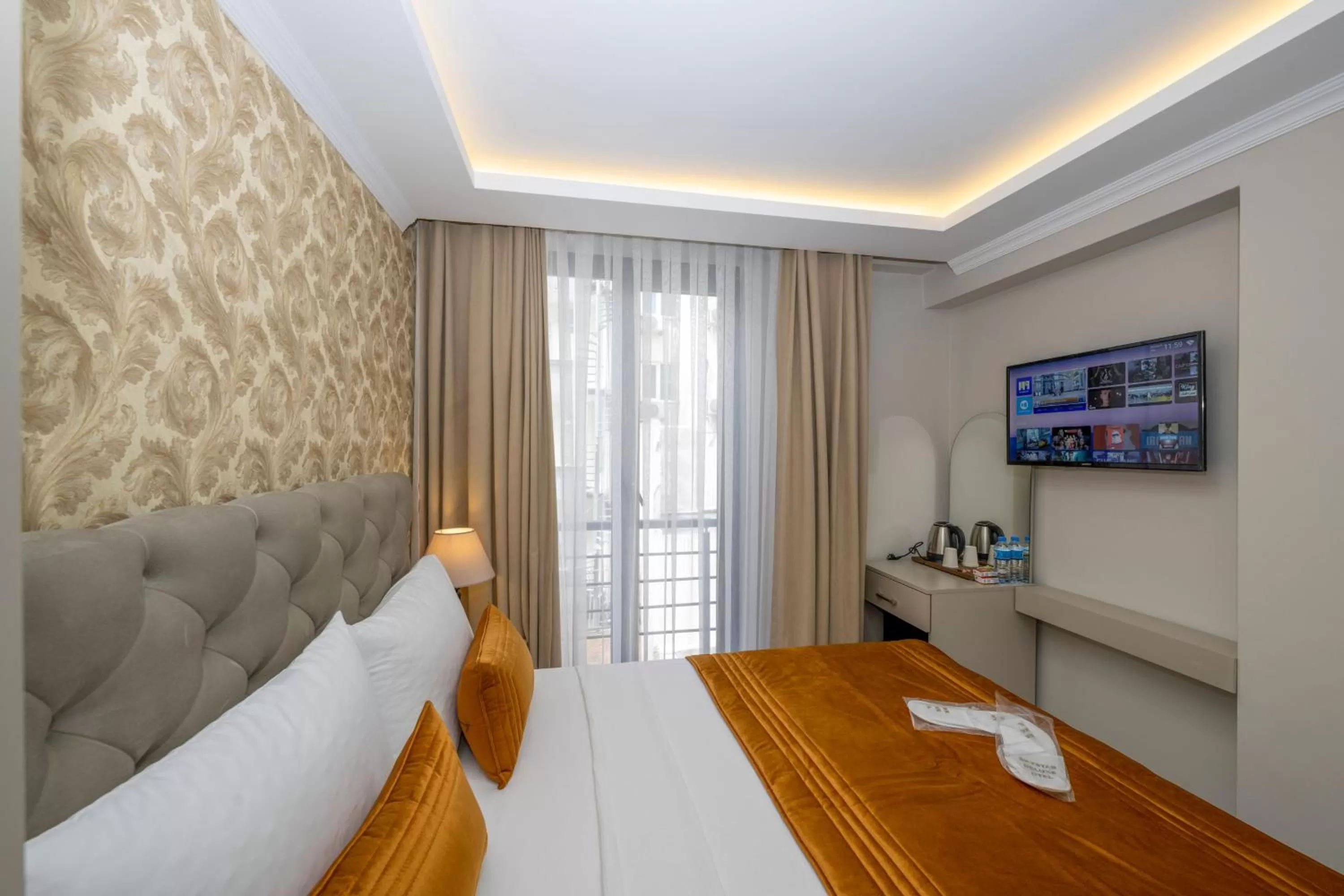 Bed in SKYSTAR DELUXE HOTEL