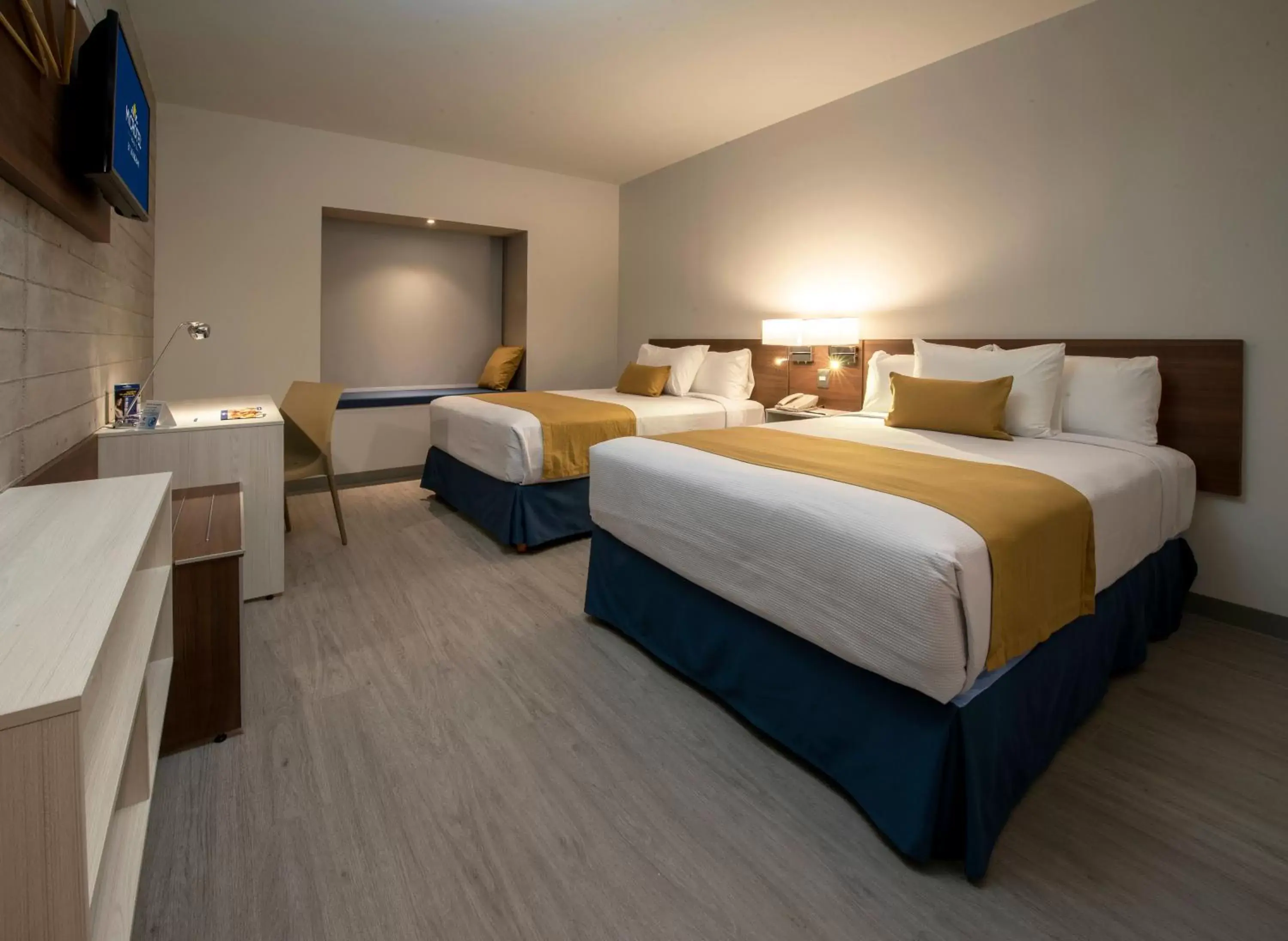 Bed in Microtel Inn & Suites by Wyndham Guadalajara Sur