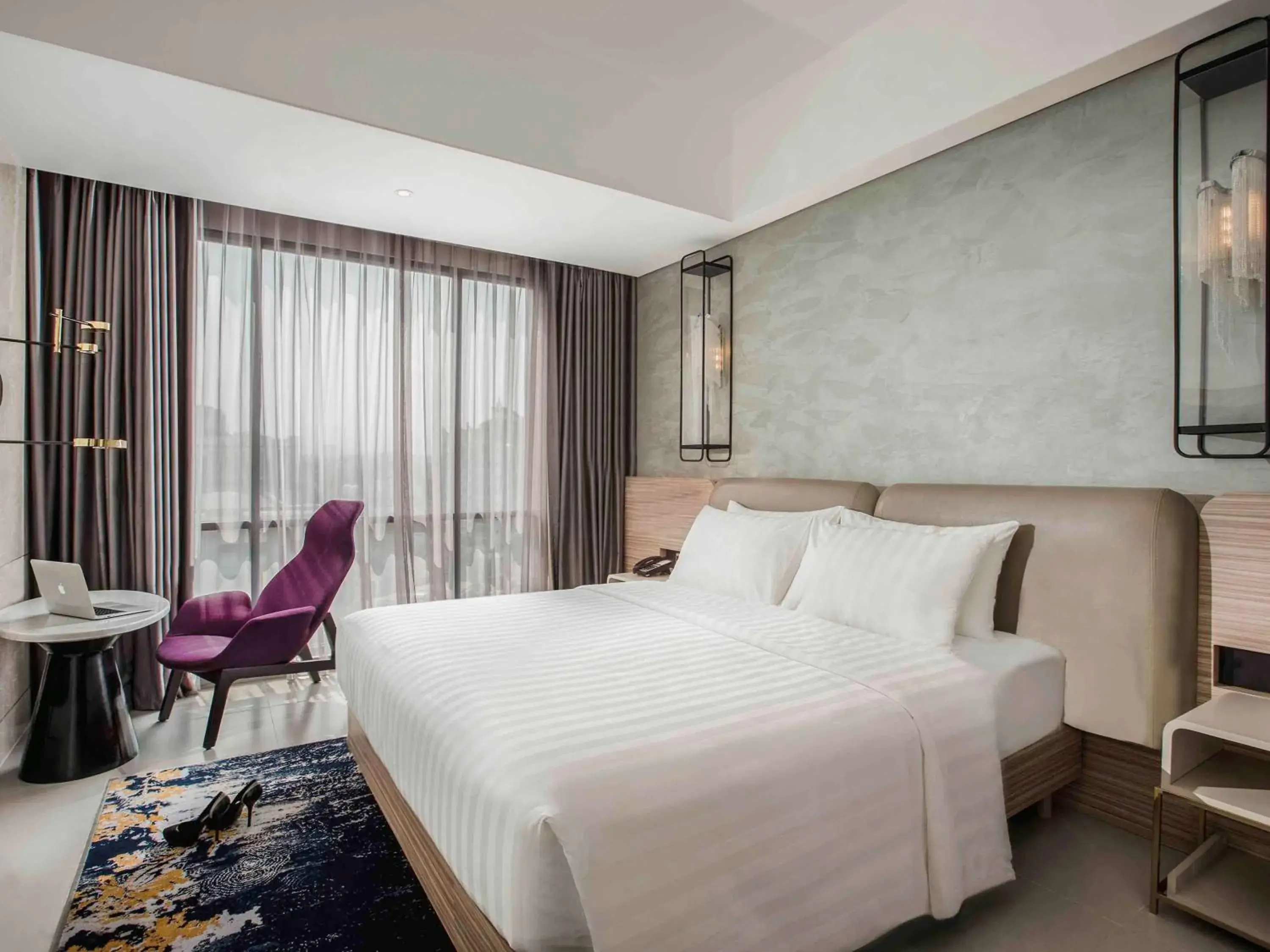 Photo of the whole room, Bed in Hotel Mercure Bandung City Centre