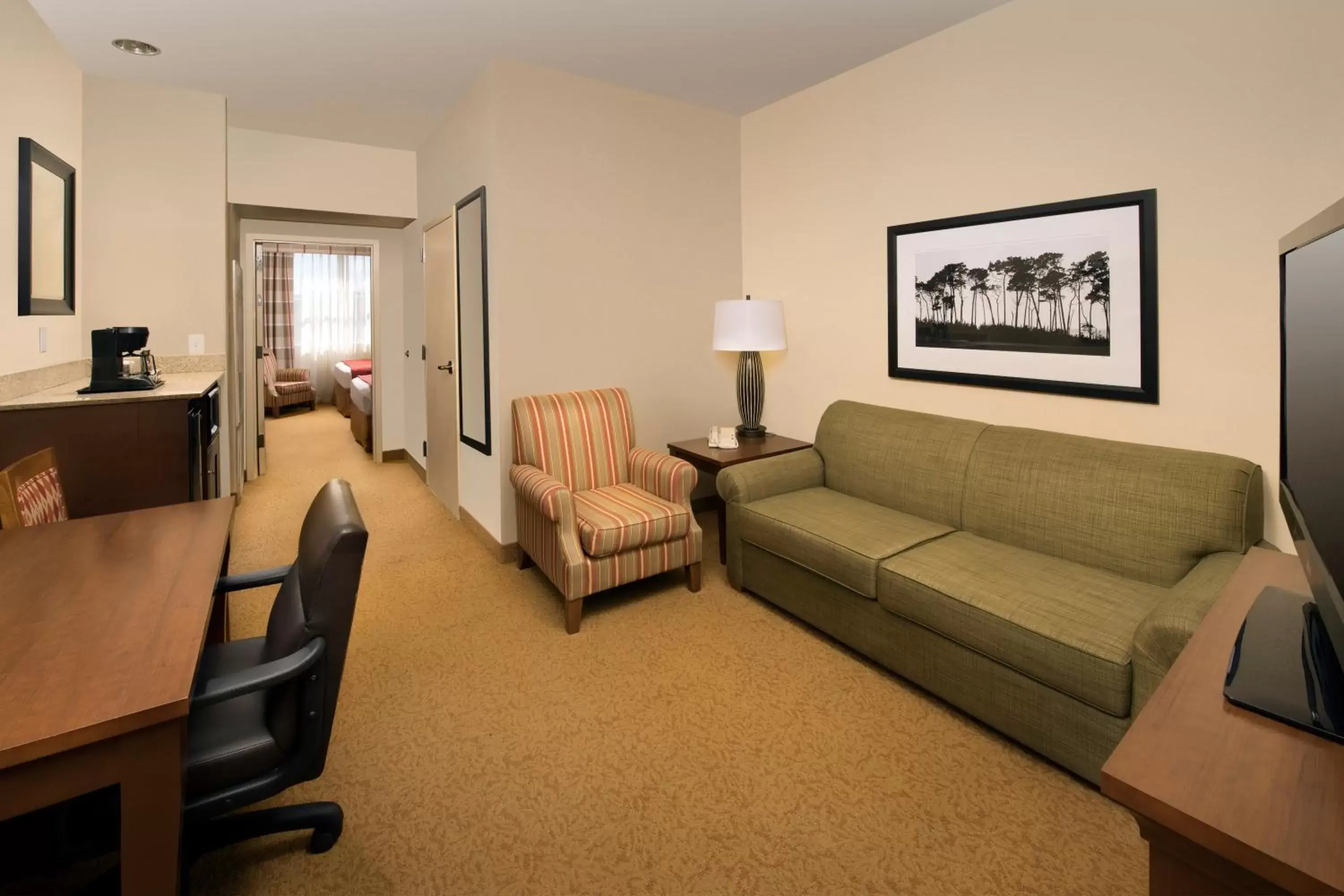 Living room, Seating Area in Country Inn & Suites by Radisson, Houston Intercontinental Airport East, TX