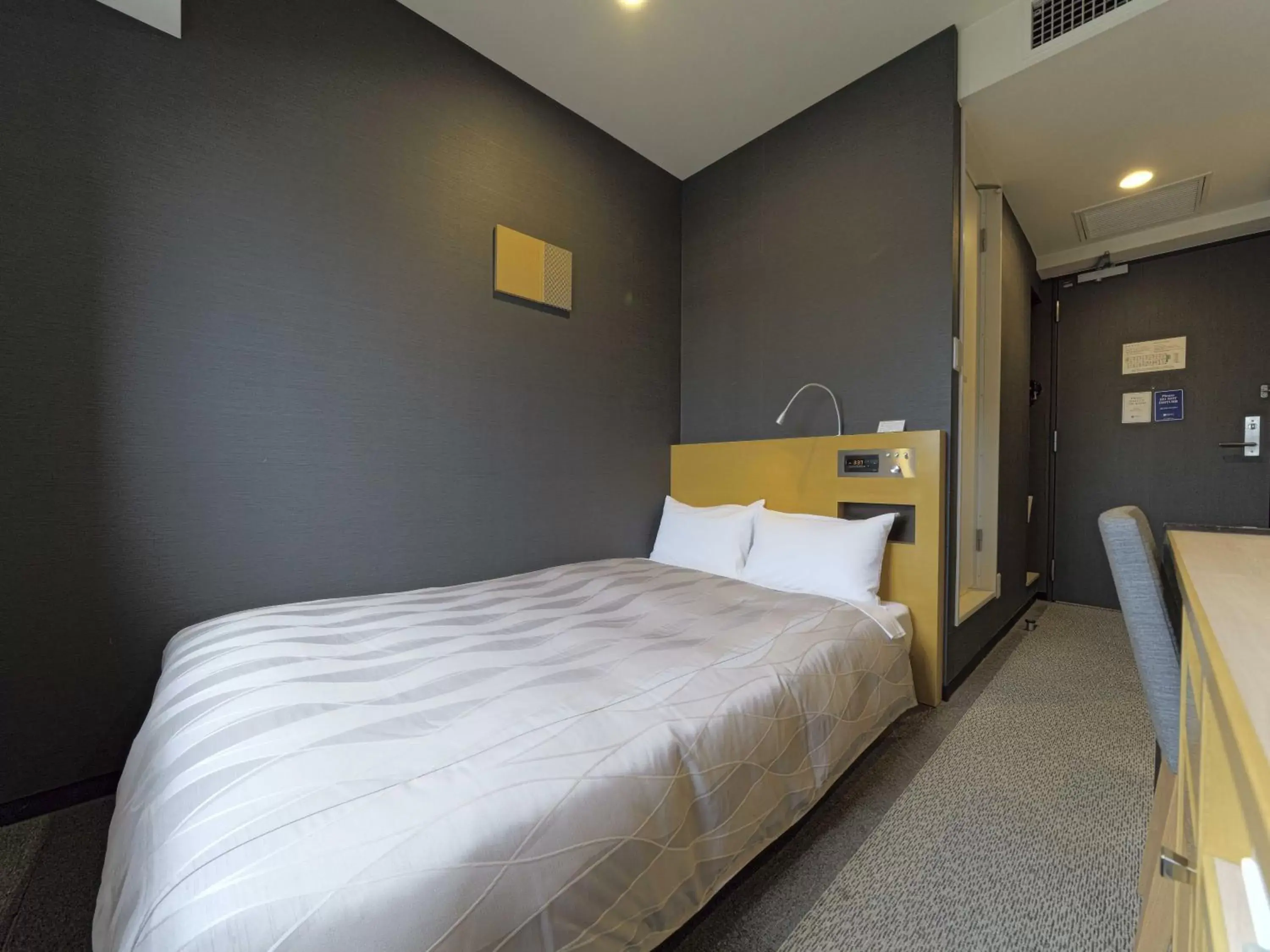 Bed in Meitetsu Inn Chita Handa Ekimae Bed in Meitetsu Inn Chita Handa Ekimae