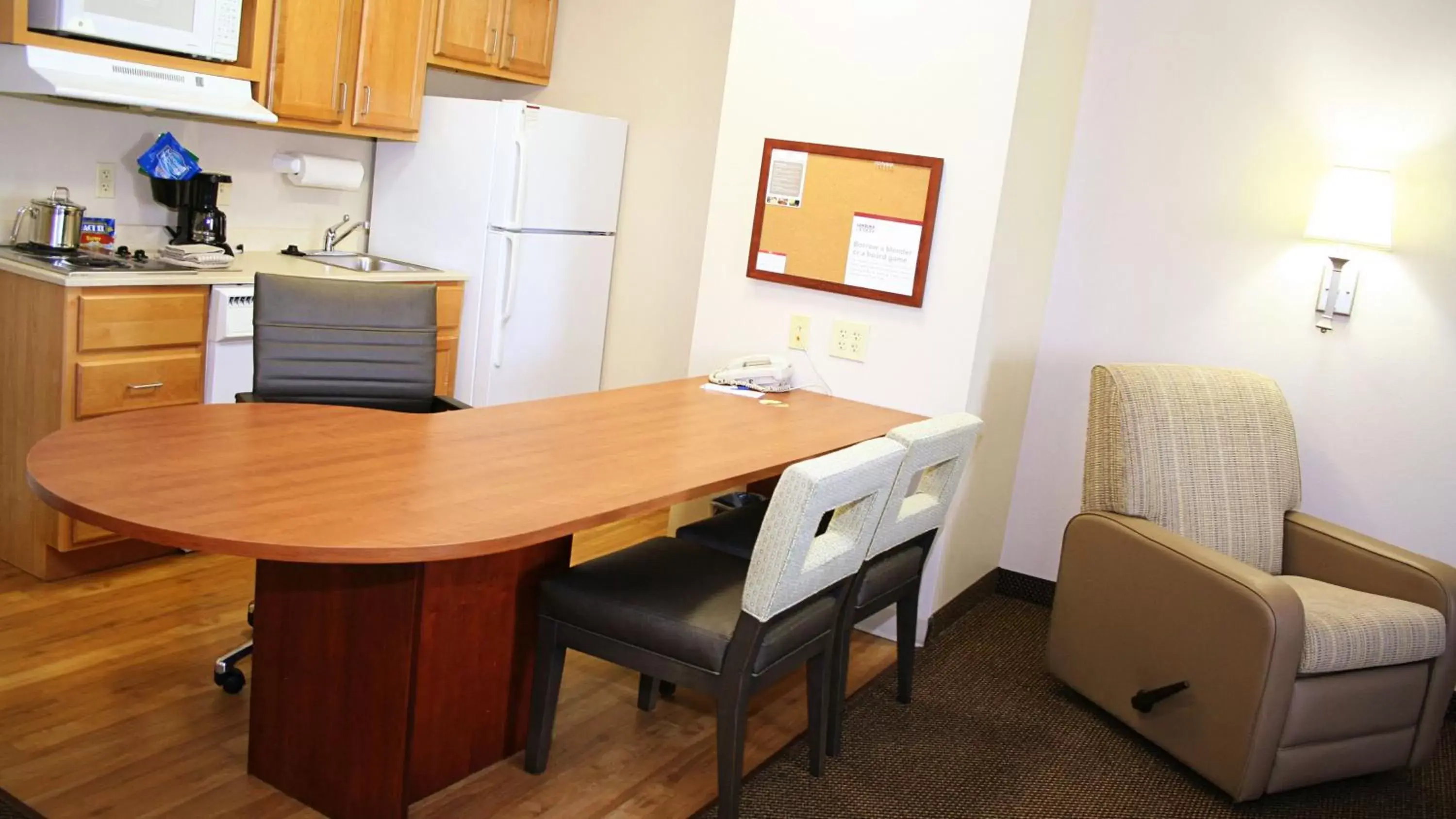 Photo of the whole room, Kitchen/Kitchenette in Candlewood Suites Harrisonburg, an IHG Hotel