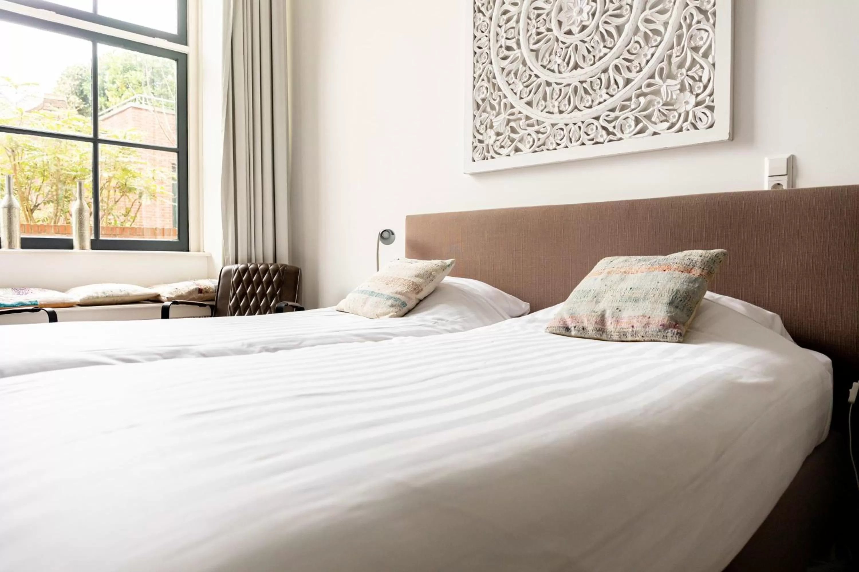 Bed in 1001 Nights Boutique Hotels