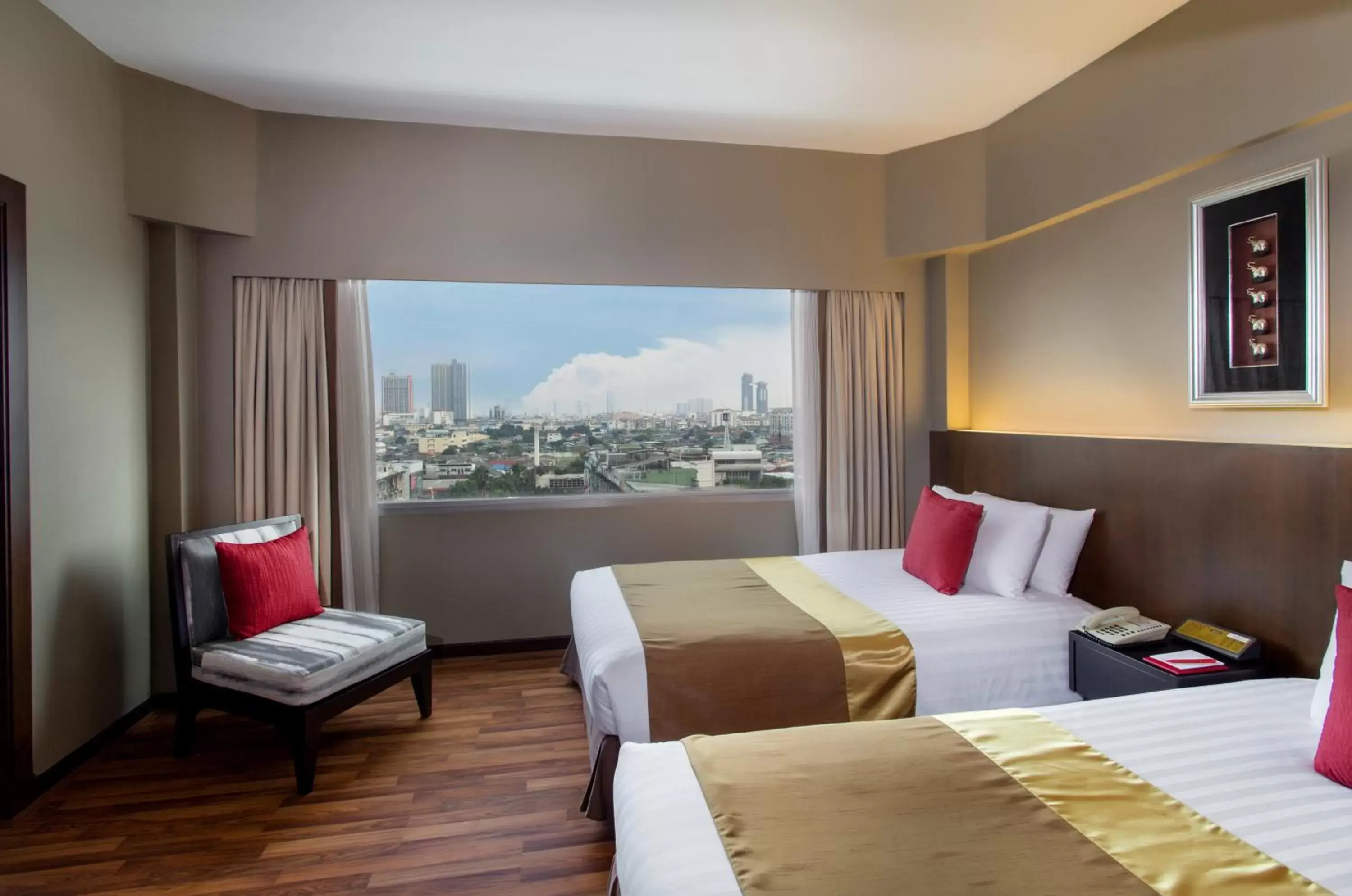 Twin Suite with City View in Ramada Plaza by Wyndham Bangkok Menam Riverside