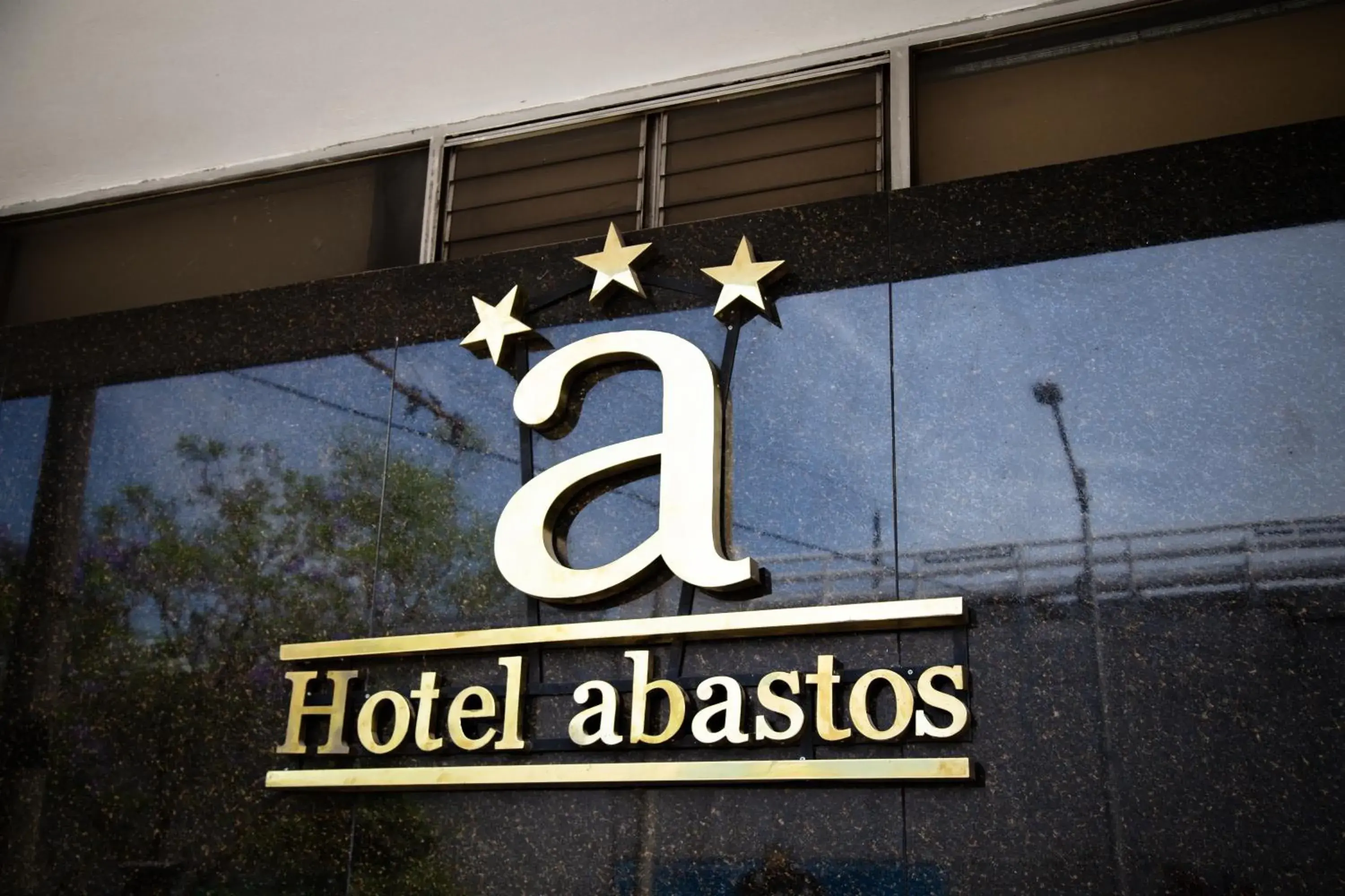 Property logo or sign in Hotel Expo Abastos
