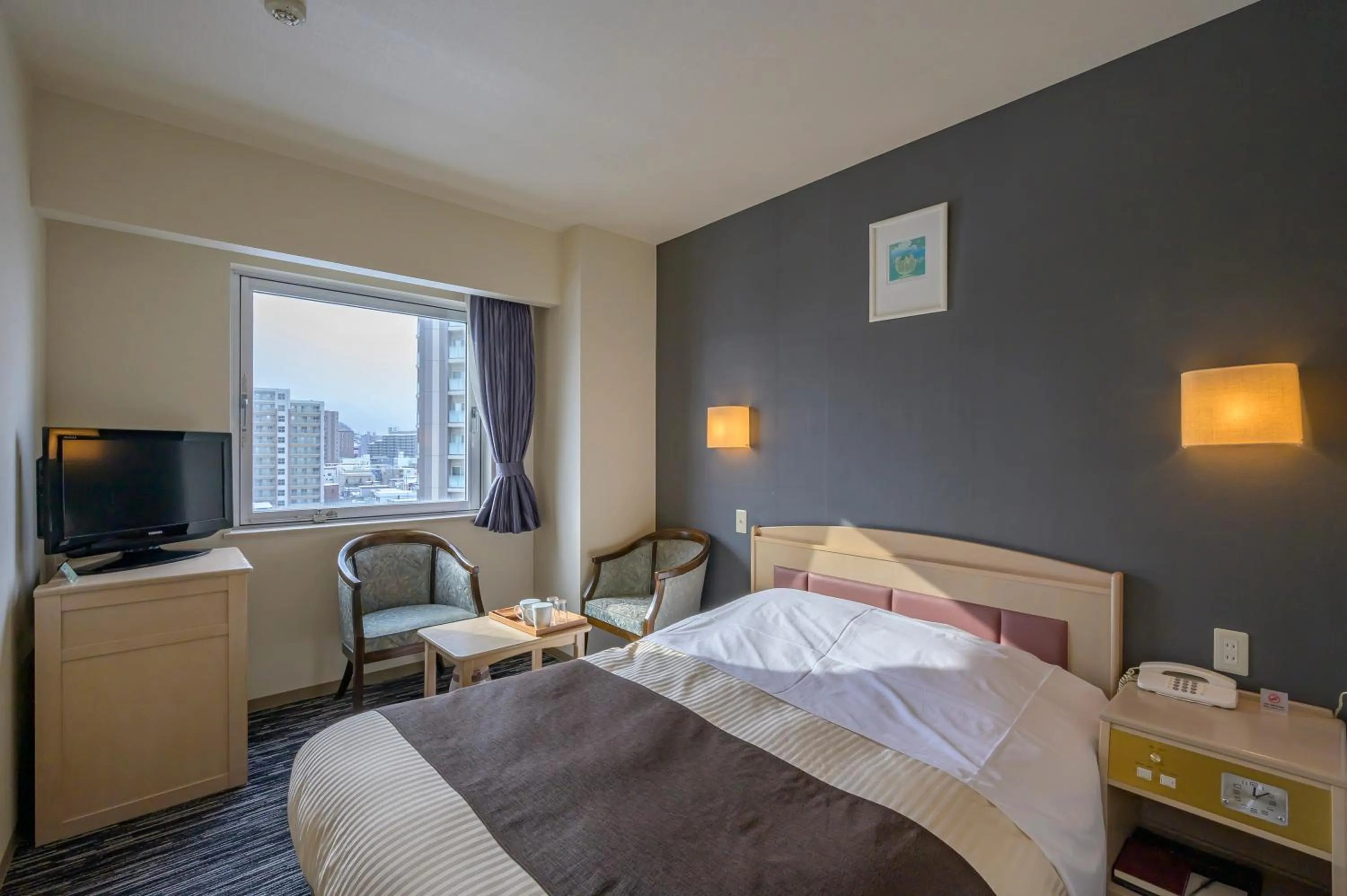 Bedroom, Bed in Kotoni Green Hotel