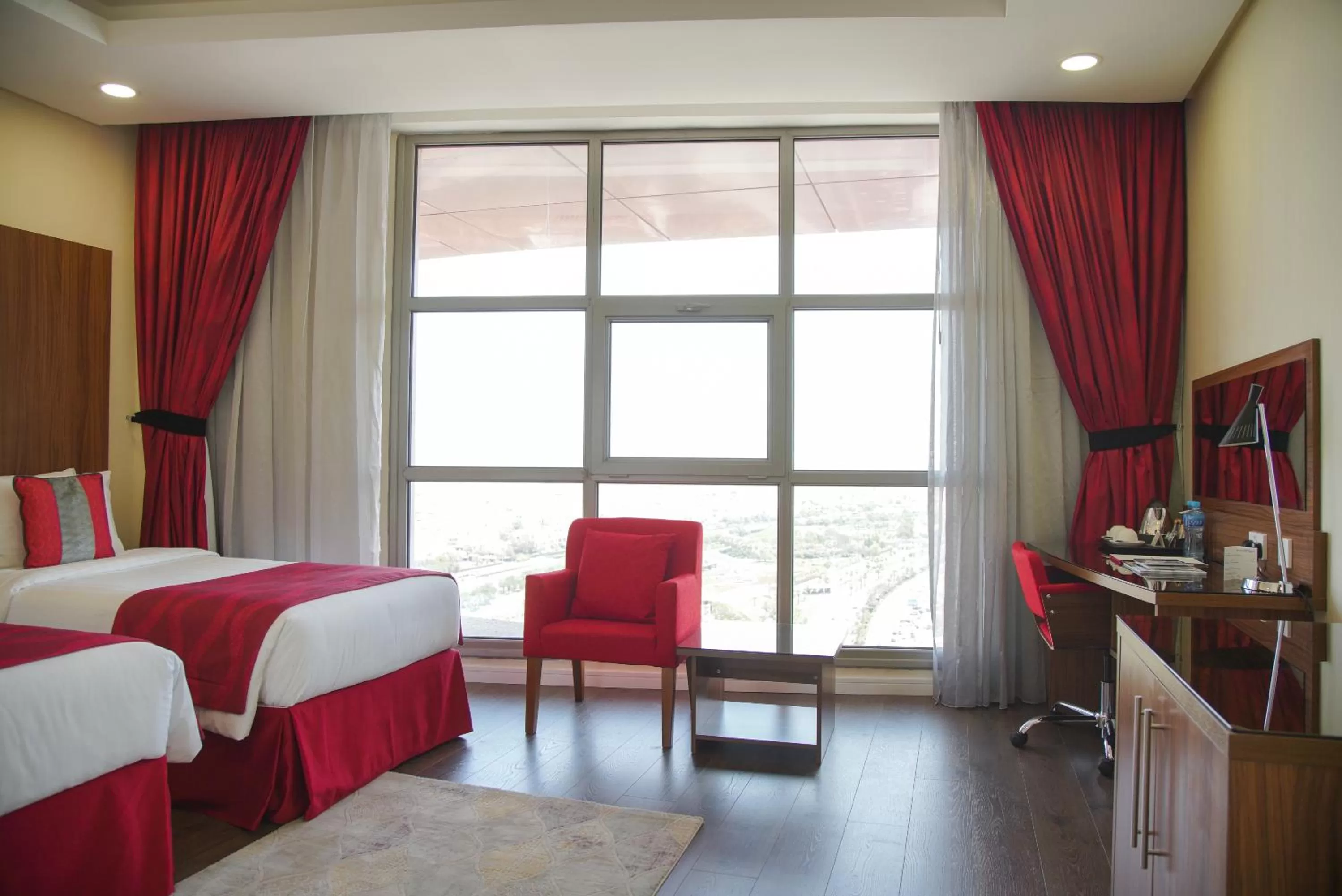Photo of the whole room, Bed in Ramada Encore by Wyndham Kuwait Downtown