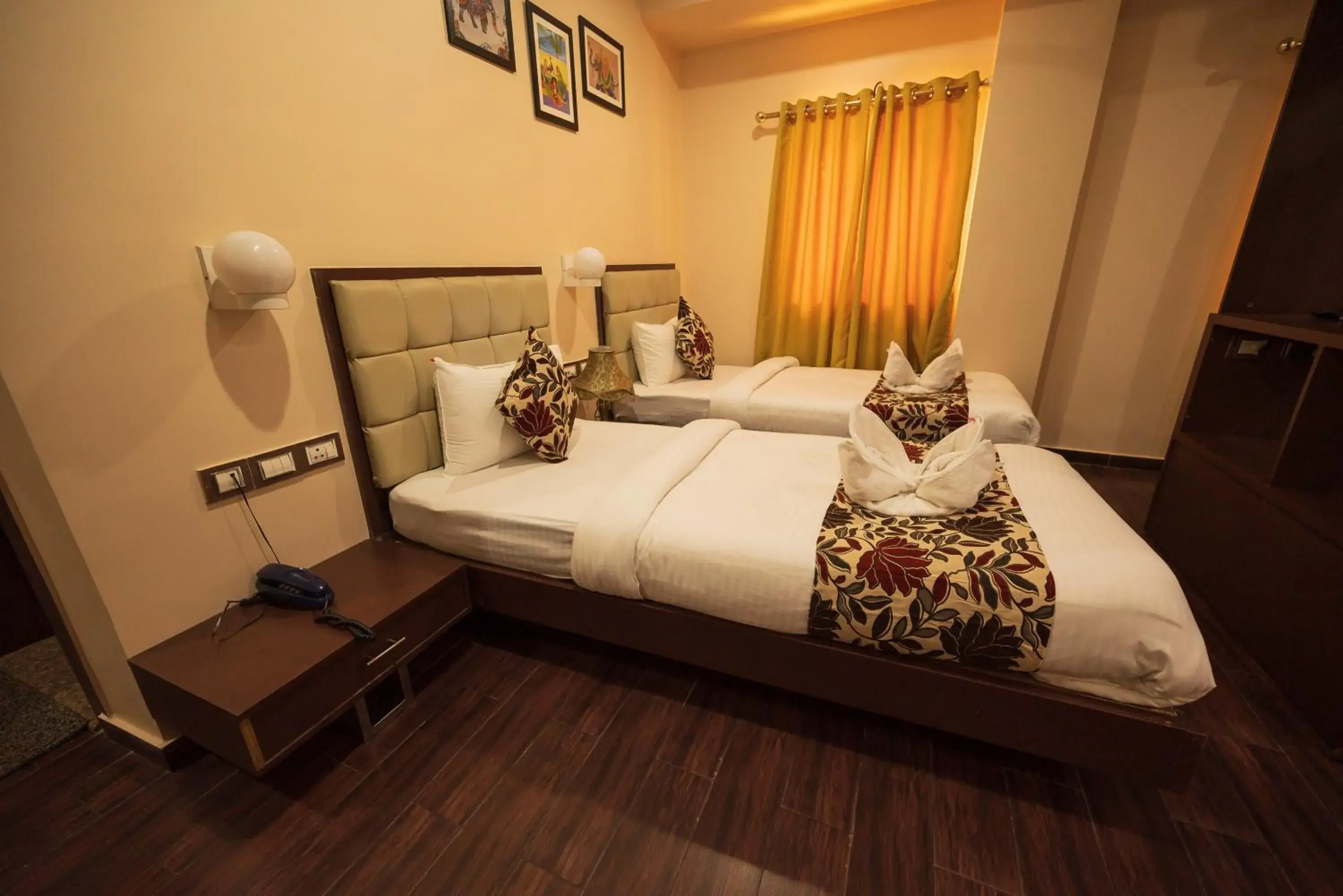 Bed in Rajdarbar Hotel & Banquets