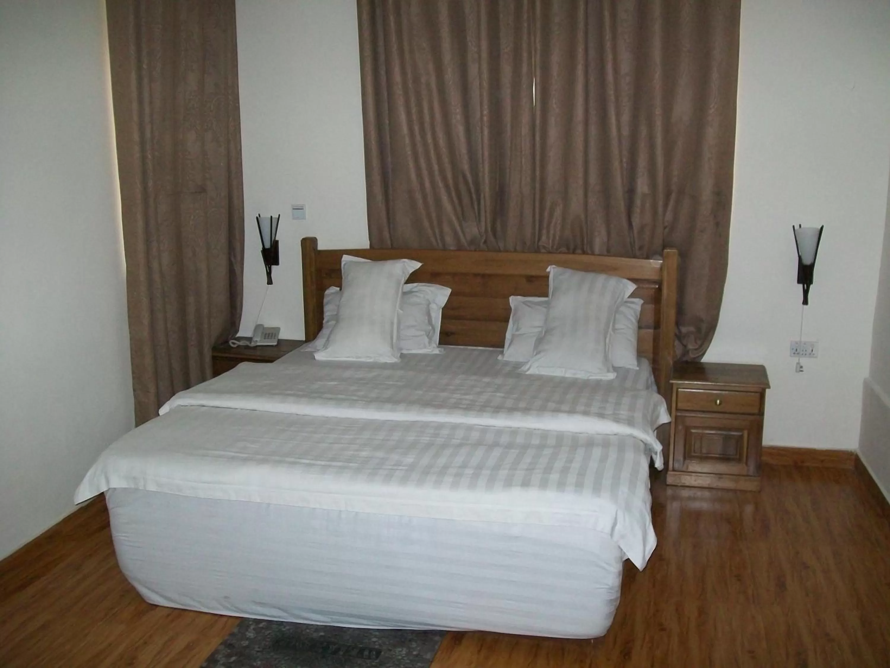 Bed in Ampomaah Hotel