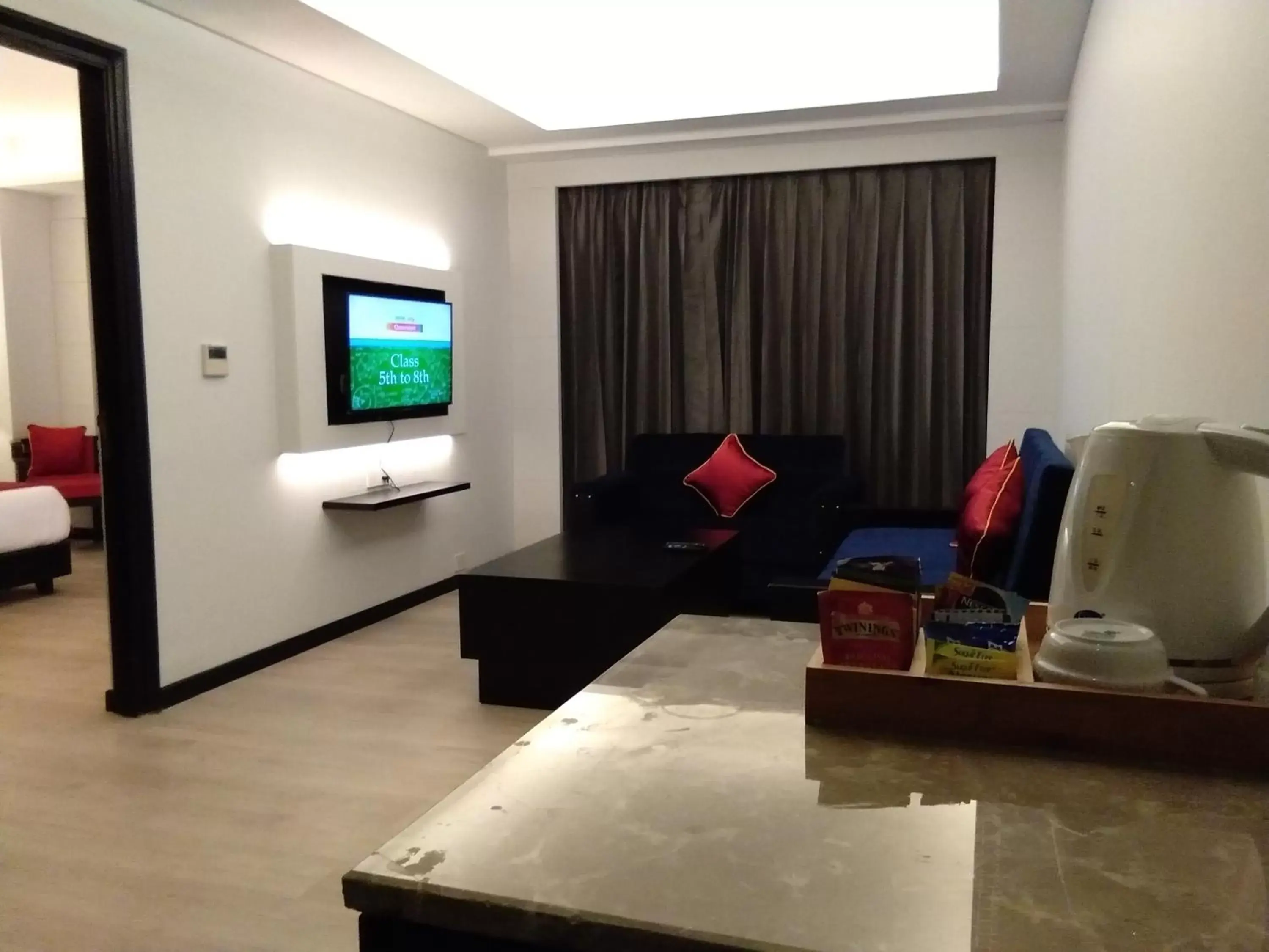 Living room, TV/Entertainment Center in Ramada Encore Jalandhar