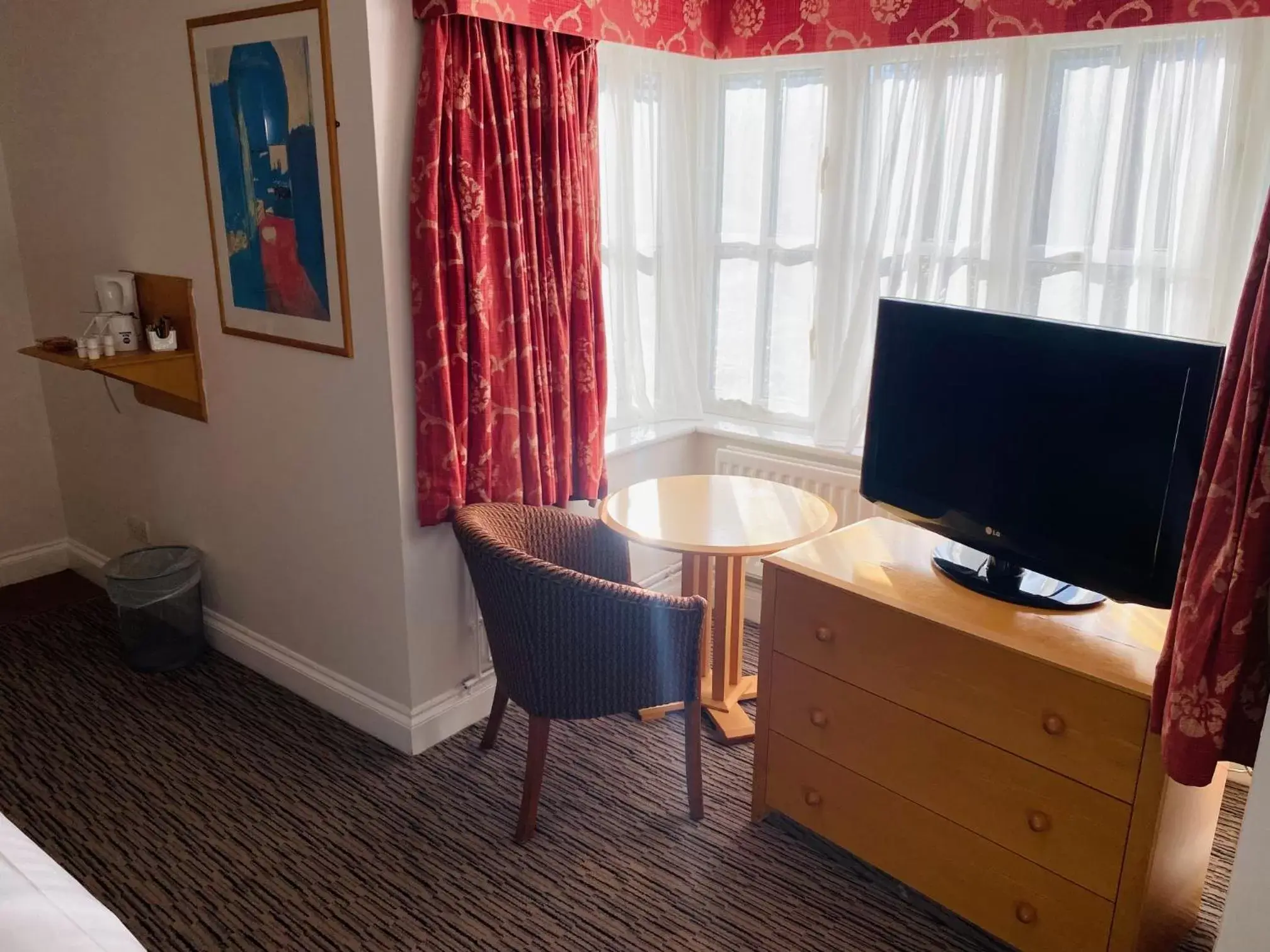 TV and multimedia, TV/Entertainment Center in Best Western Priory Hotel