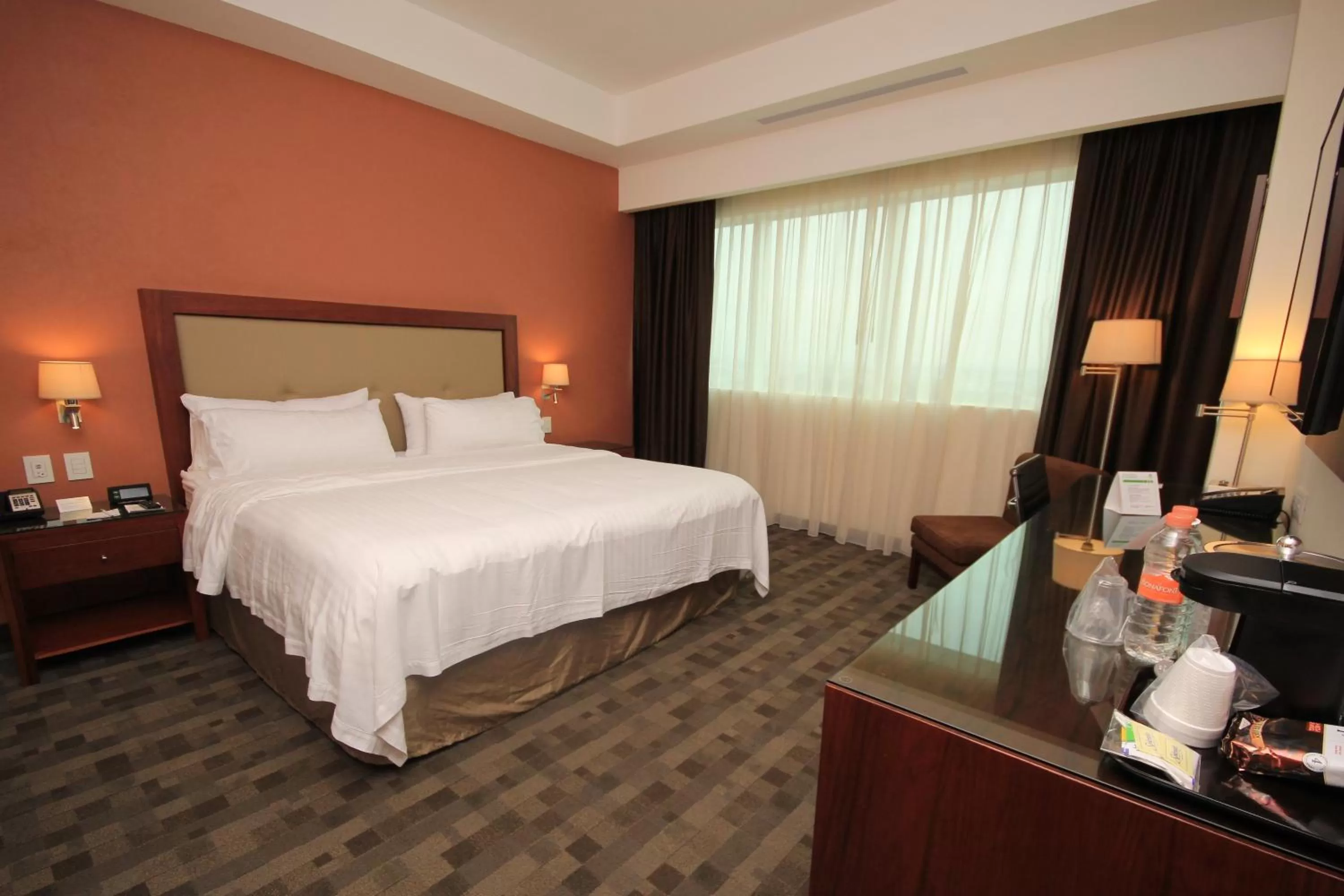 Photo of the whole room, Bed in Holiday Inn & Suites Plaza Mayor by IHG