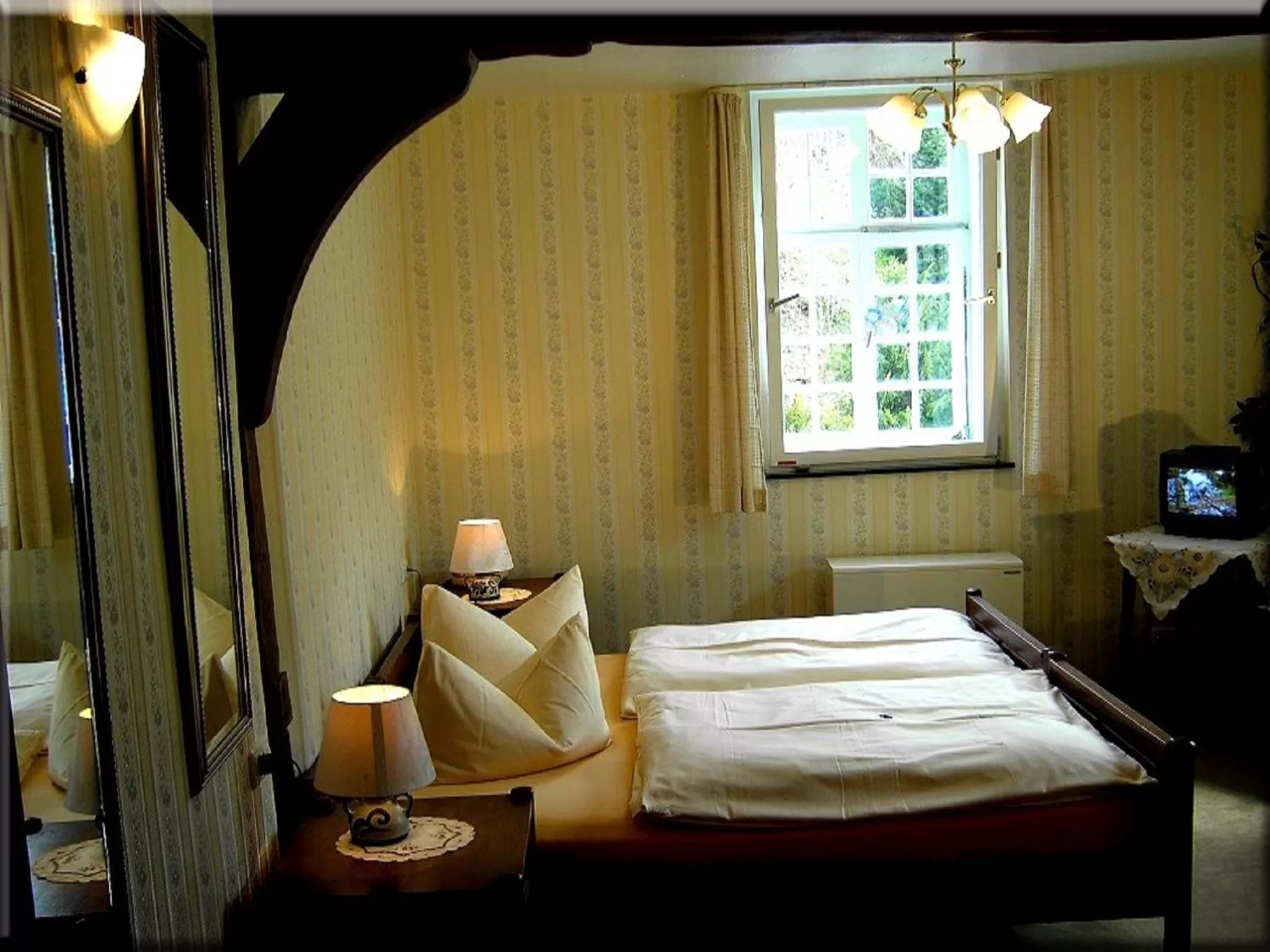 Photo of the whole room, Bed in Hotel Graf Rolshausen