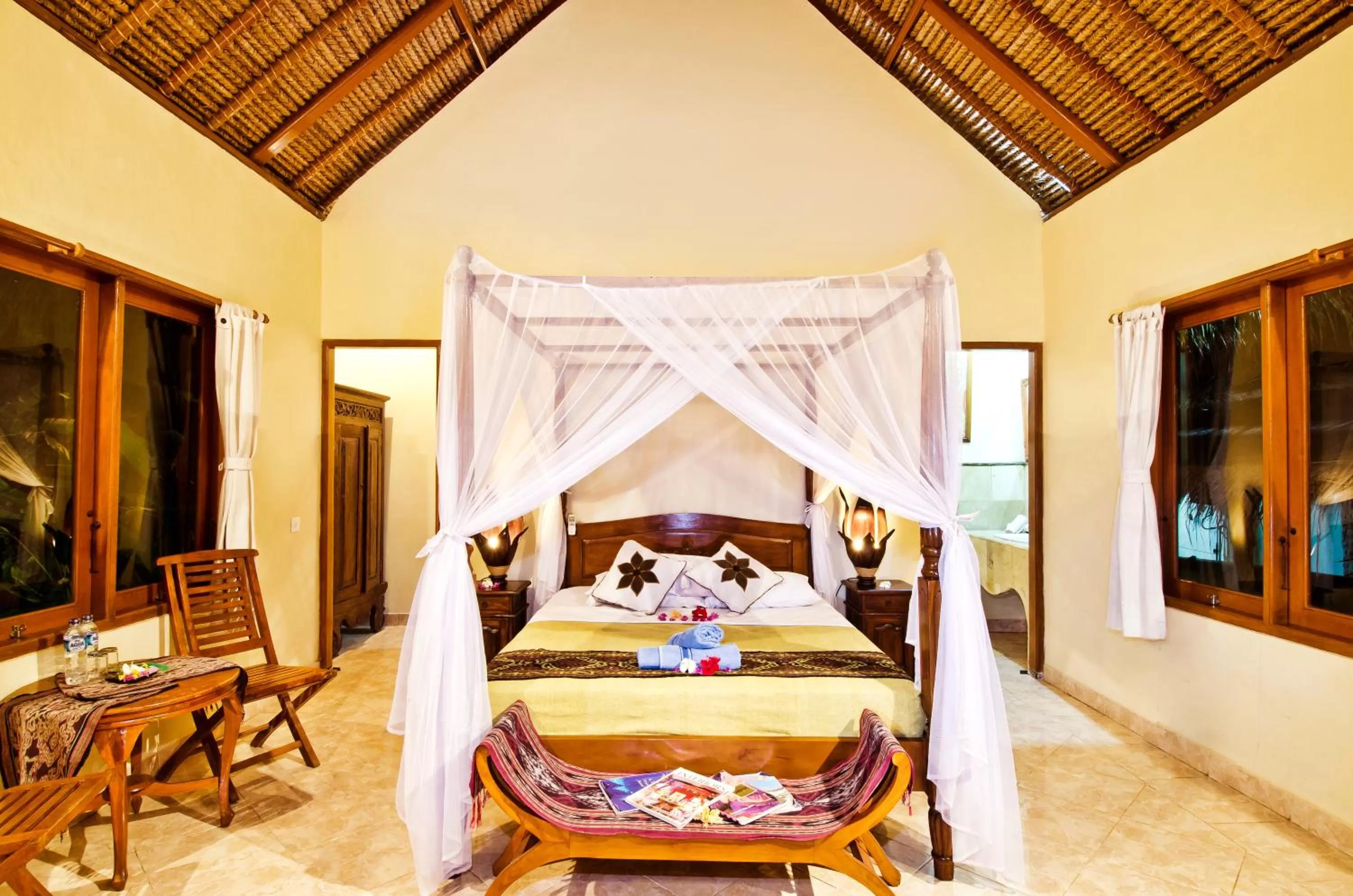 Bed in Mushroom Beach Bungalows