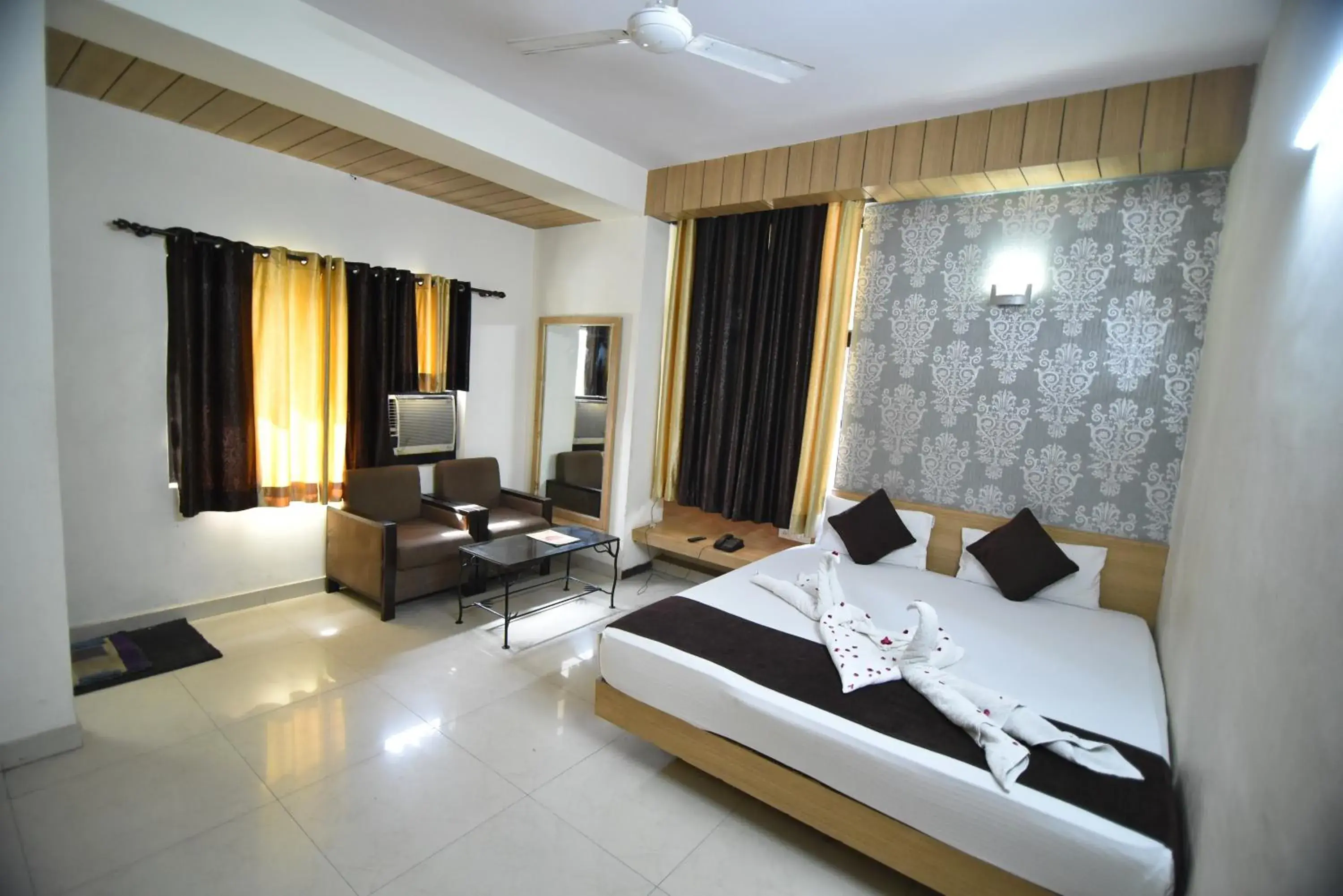 Bedroom, TV/Entertainment Center in Hotel Vaishnavi