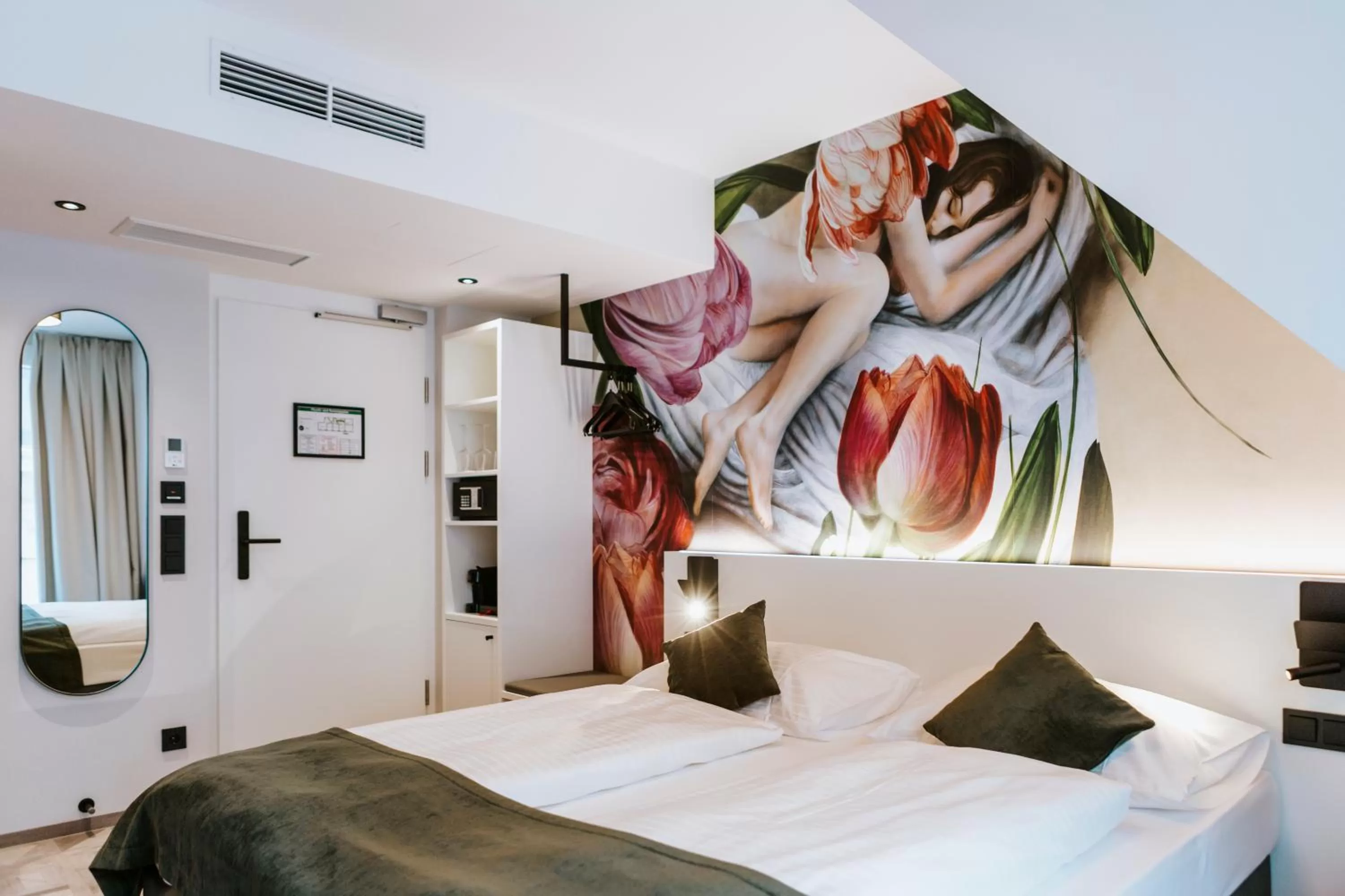 Bed in ART-INN Design Self-Check-in-Hotel