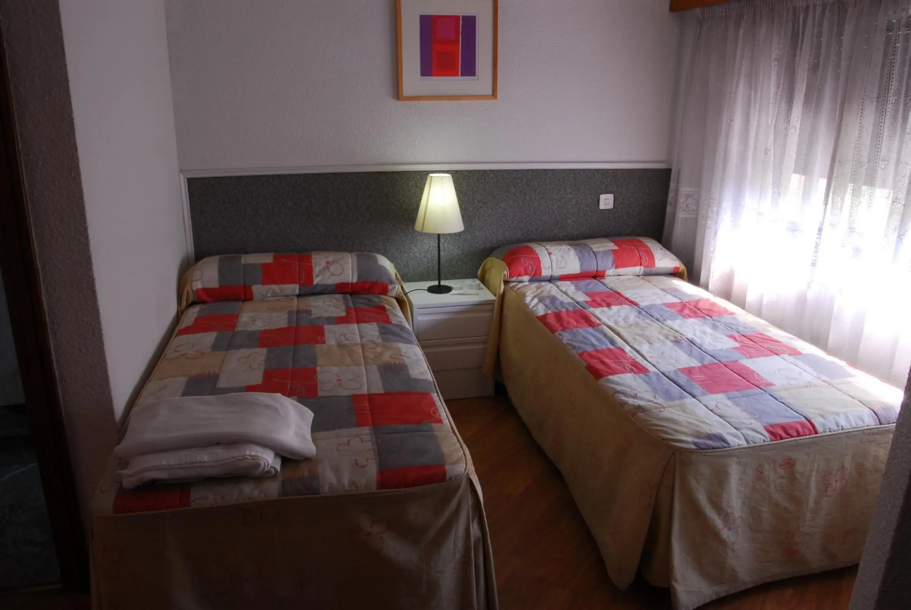 Bed in Apartamentos Goya 75