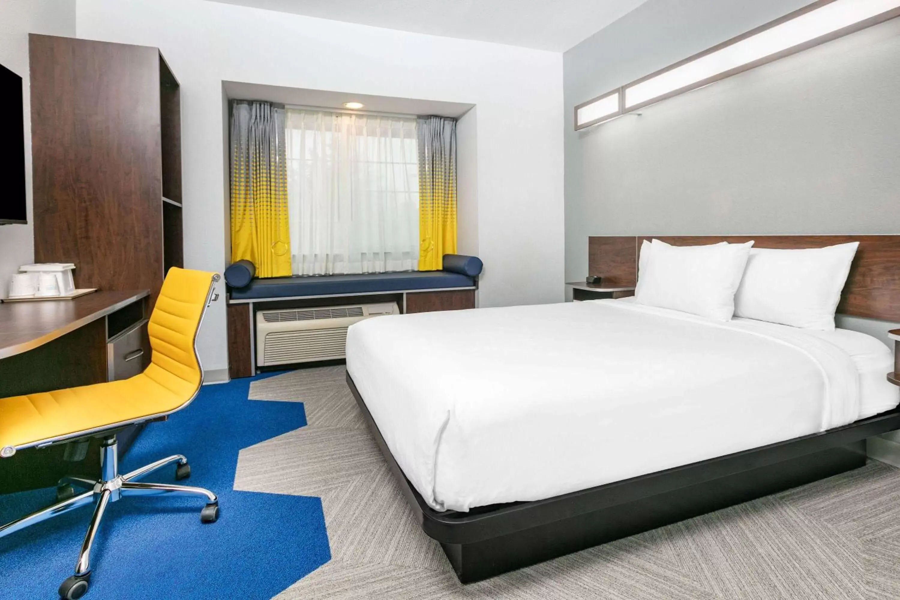 Bed in Microtel Inn & Suites by Wyndham Austin Airport