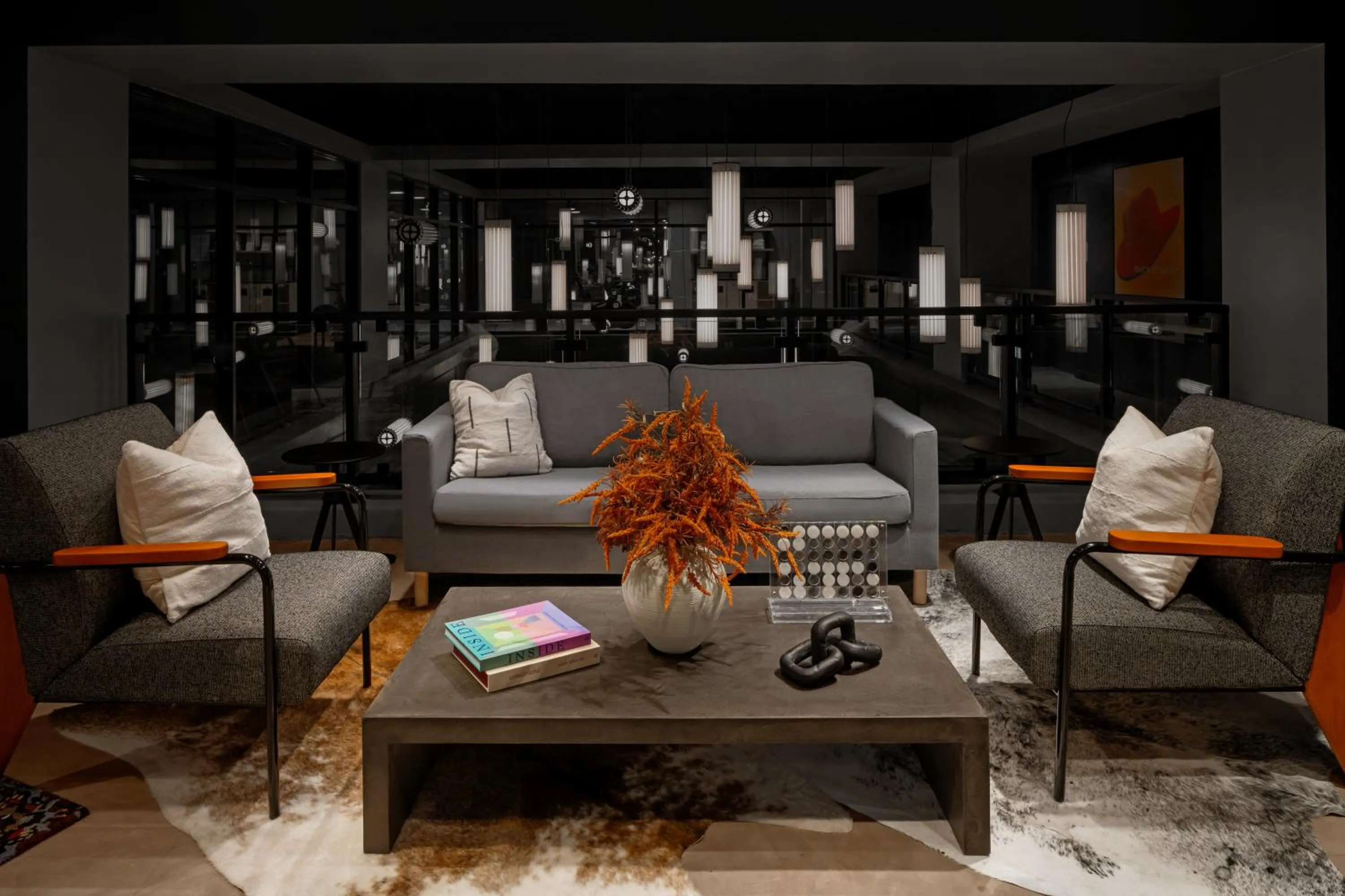 Communal lounge/ TV room in Moxy Houston Downtown