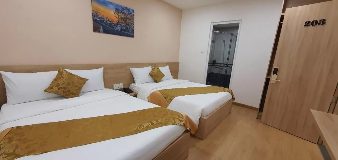 Photo of the whole room, Bed in Centro Hotel Da Lat