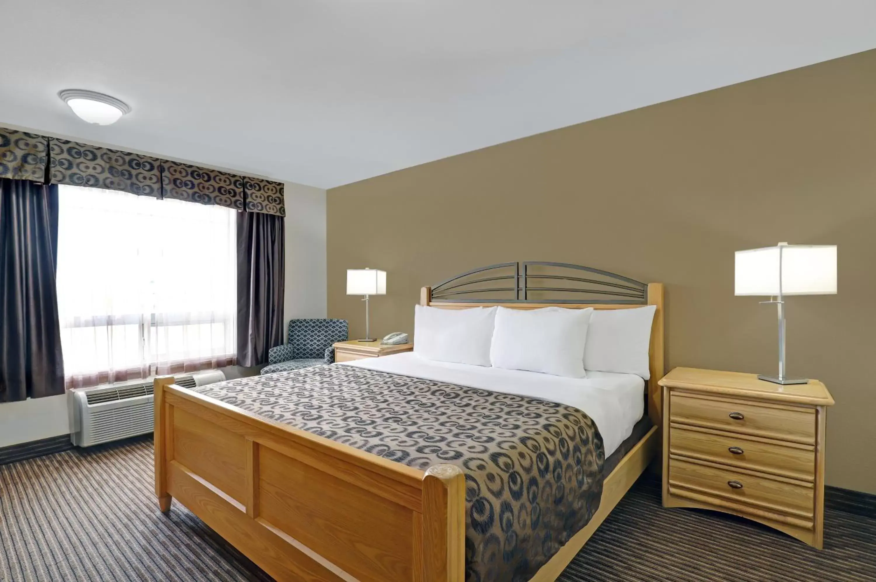 Bedroom, Bed in SureStay Plus Hotel by Best Western Drumheller