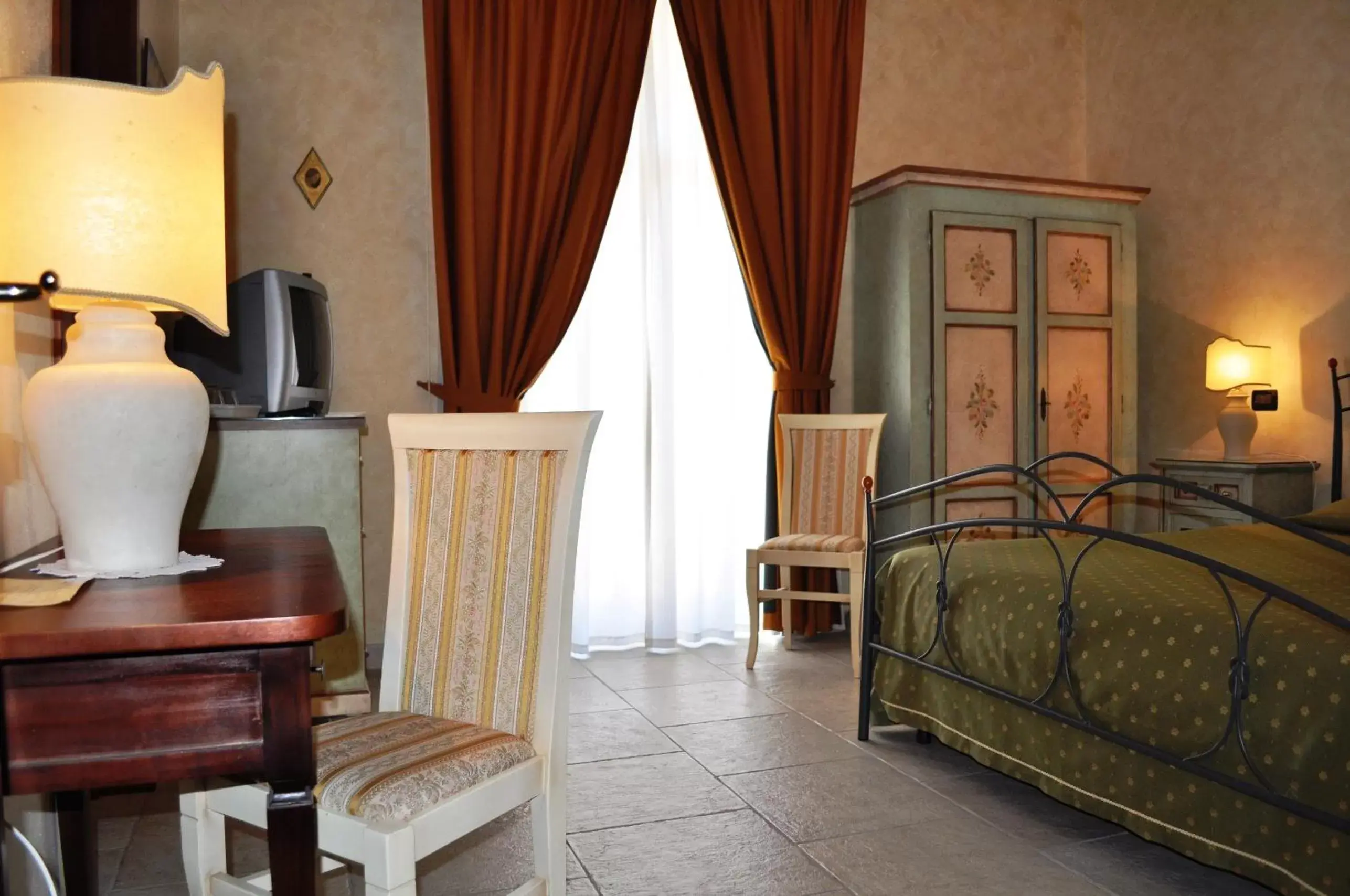 Bedroom in Grikò Country Hotel