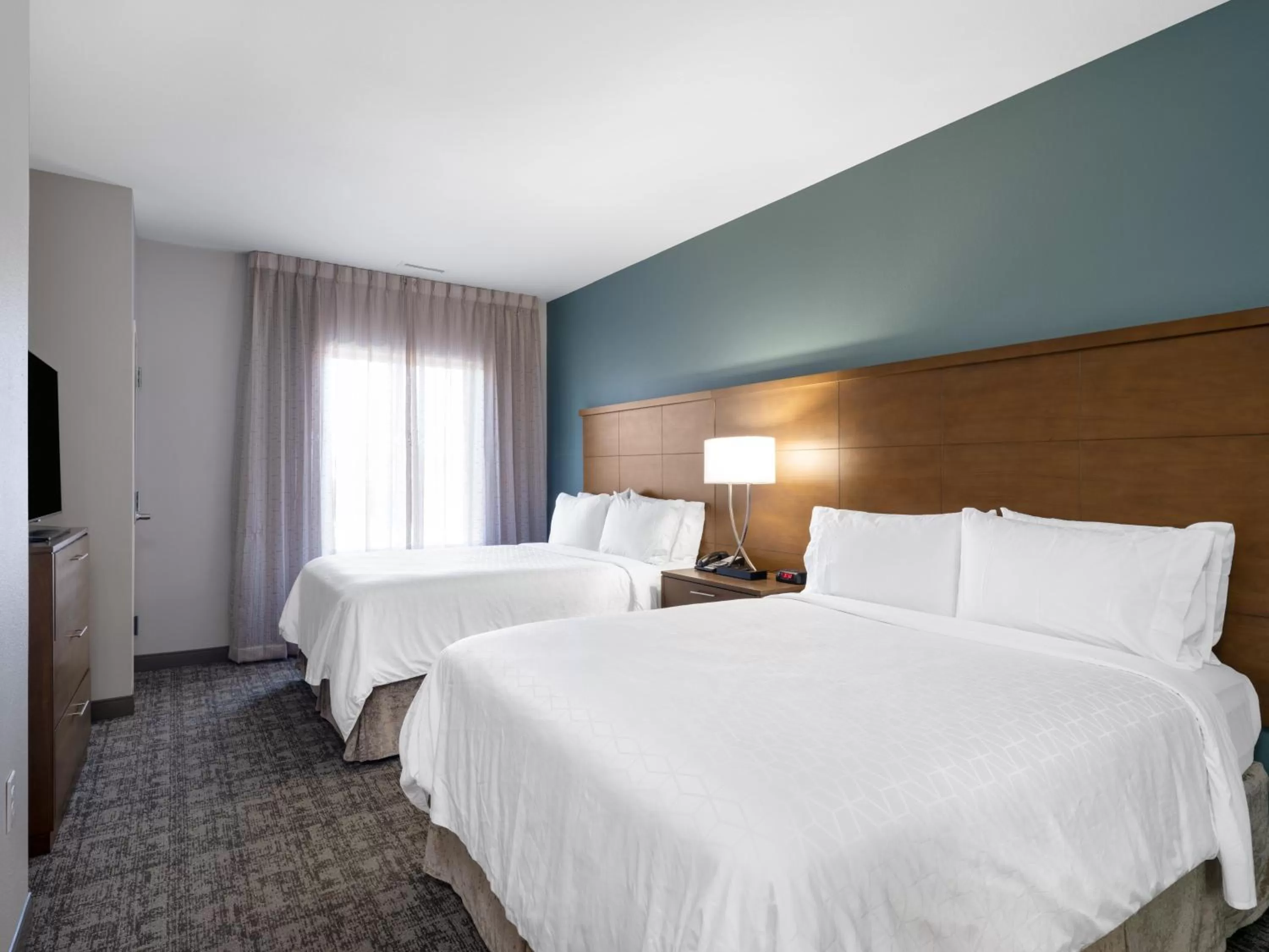 Photo of the whole room, Bed in Staybridge Suites - Sioux City Southeast by IHG