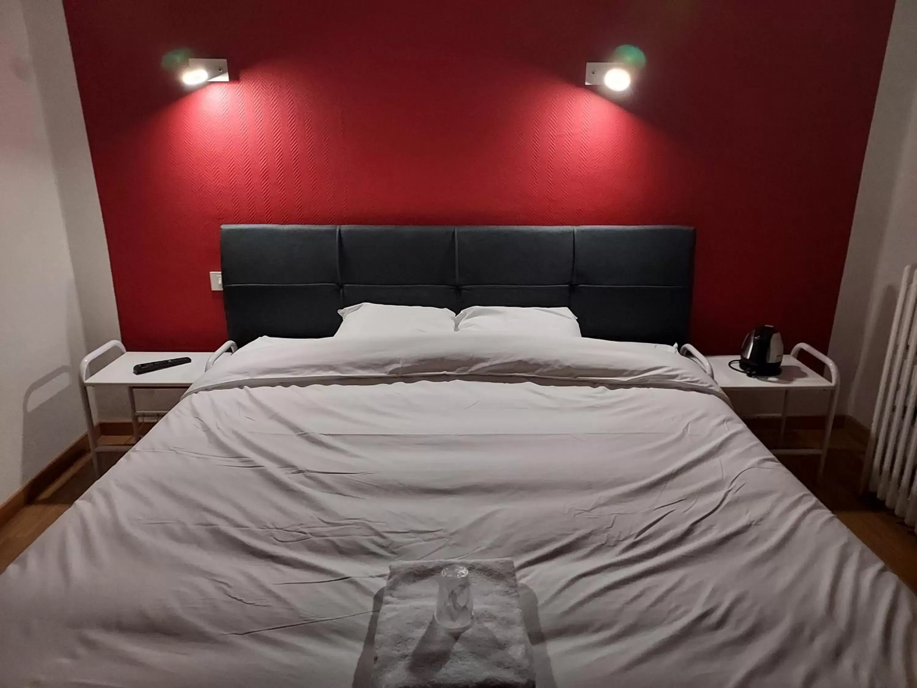 Bed in Hôtel le Comtois