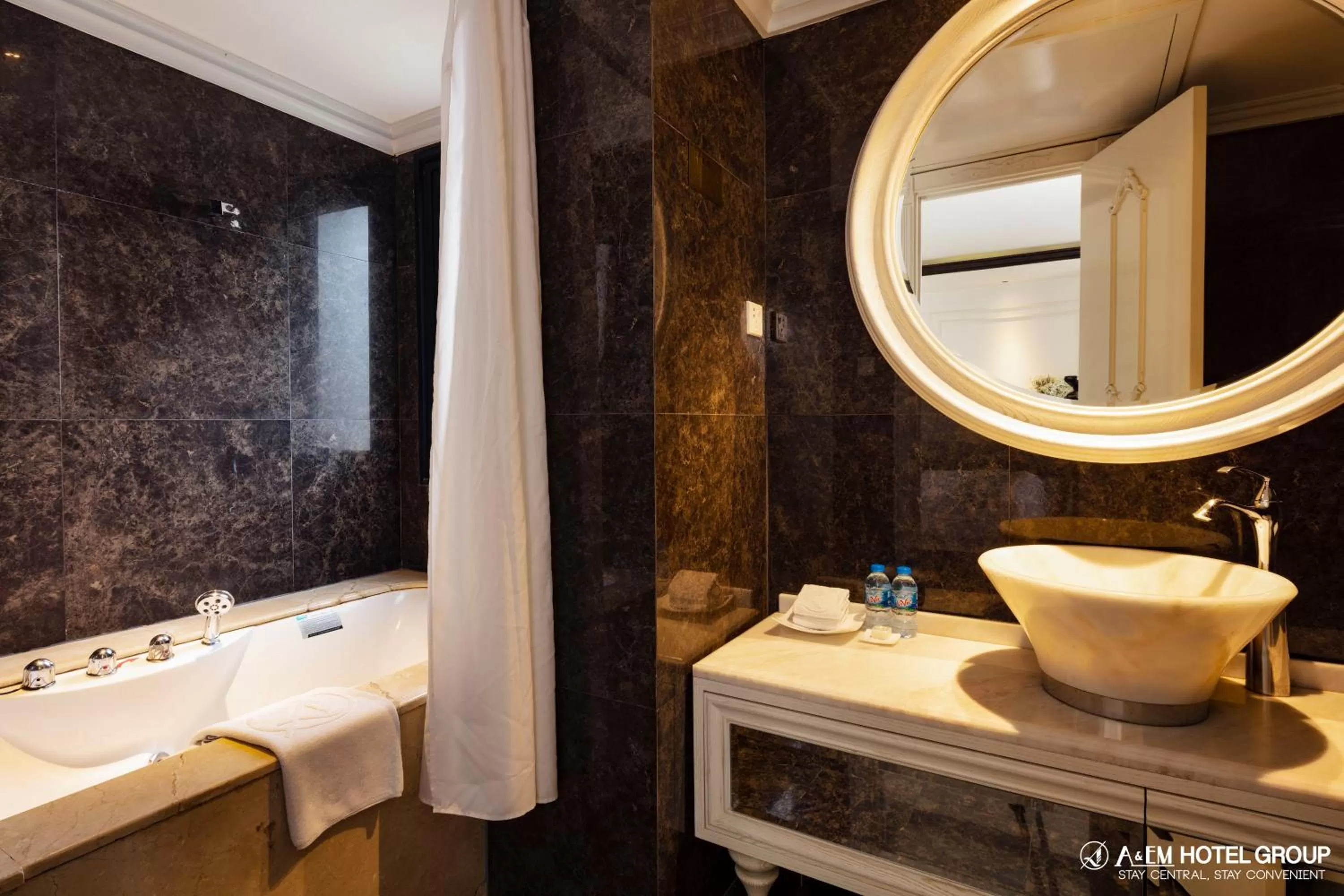 Bathroom in A&EM Saigon Hotel