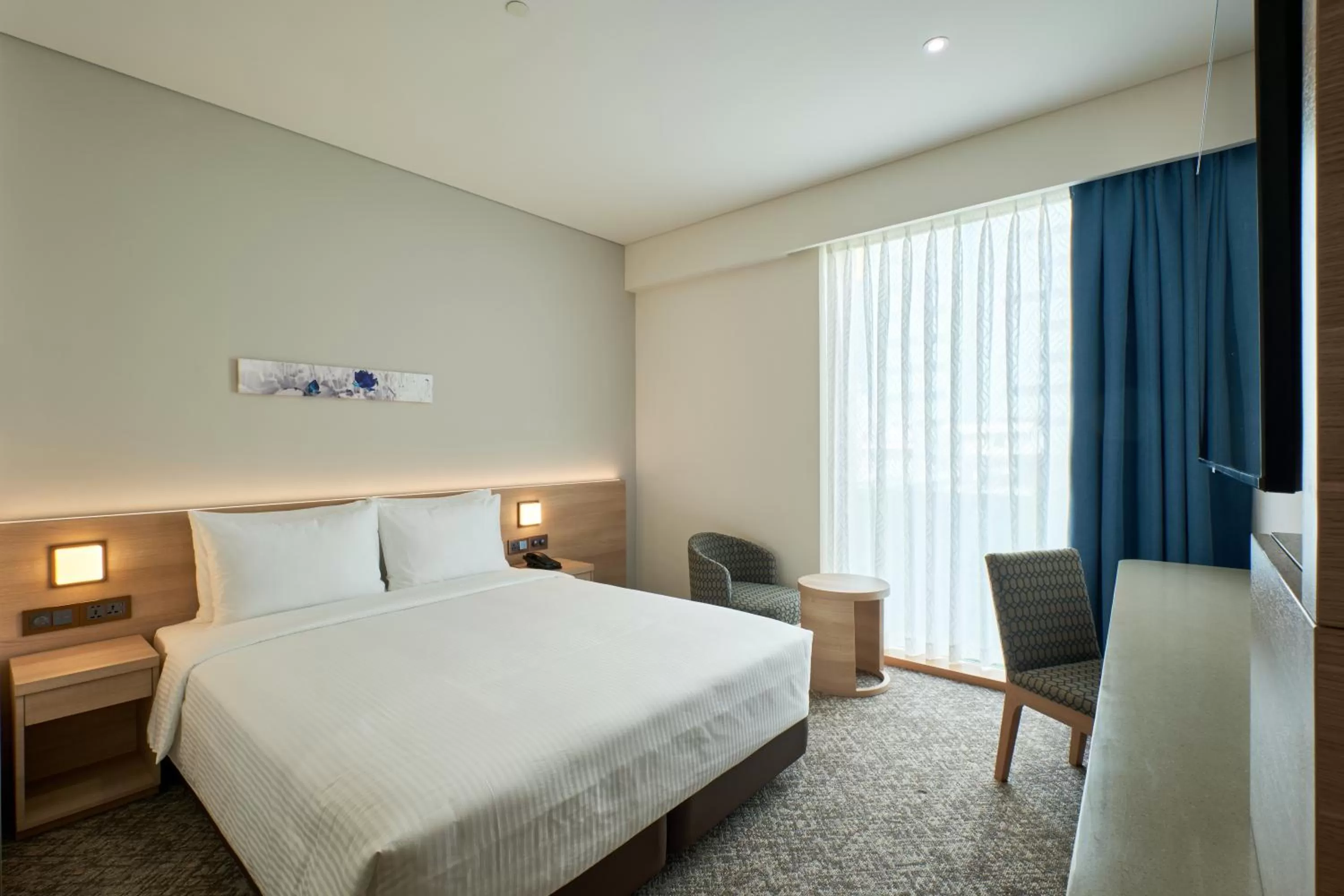 Photo of the whole room, Bed in Sotetsu Grand Fresa Saigon