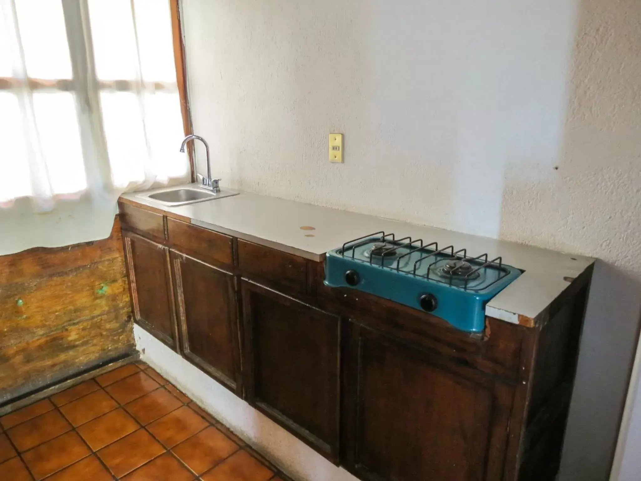 Kitchen/Kitchenette in Cabañas Yunuén by Rotamundos