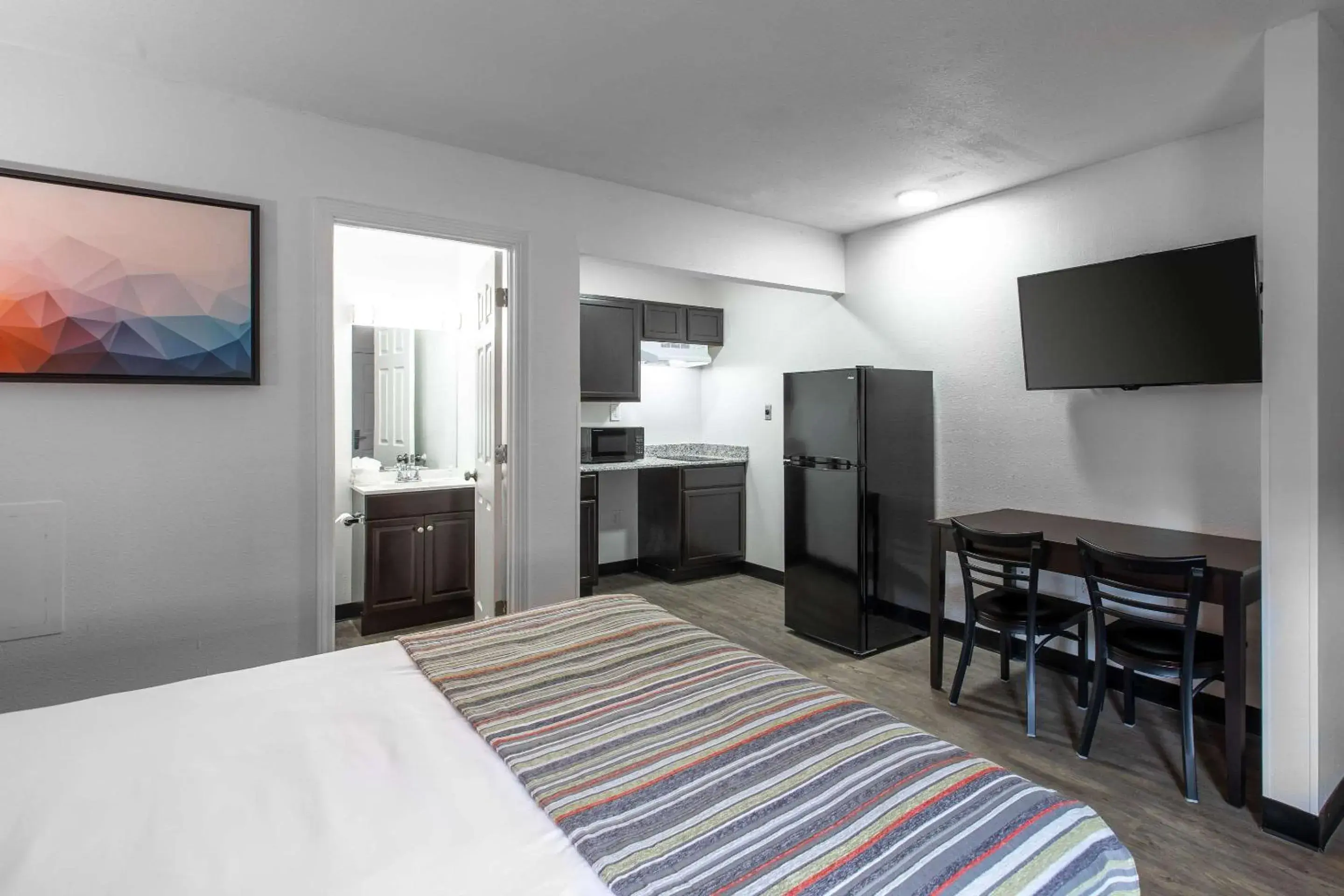 Bedroom, Bed in Suburban Studios Spartanburg - I-26 Bedroom, Bed in Suburban Studios Spartanburg - I-26