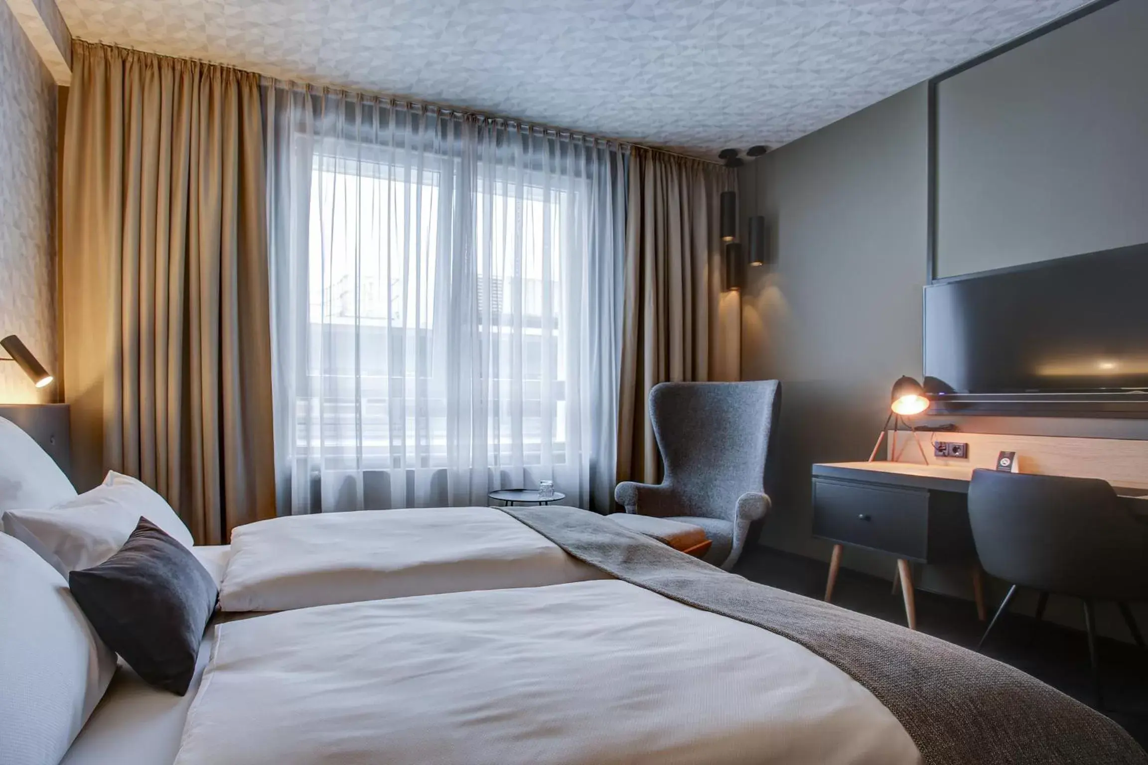 Photo of the whole room, Bed in NYCE Hotel Dortmund City