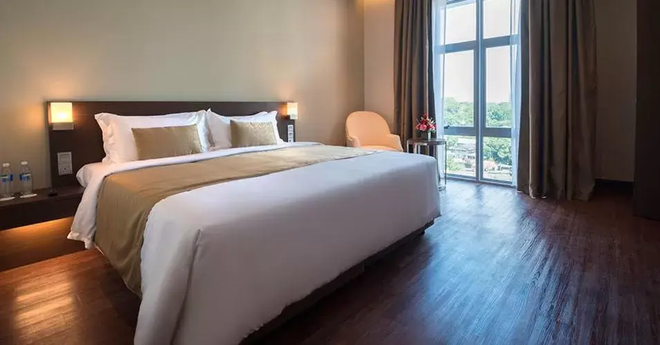 Bed in Astana Wing - Riverside Majestic Hotel
