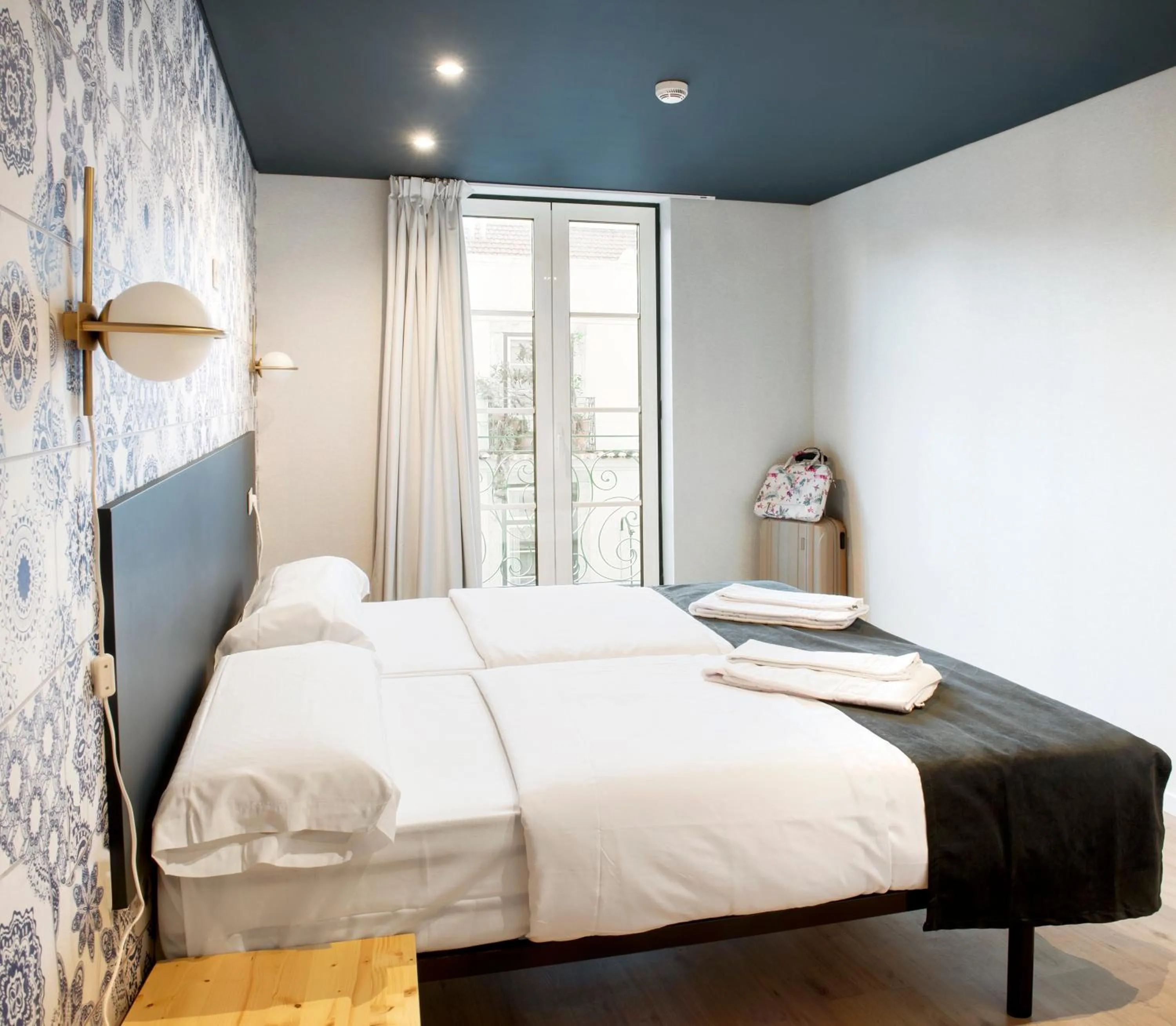 Bed in The Central House Lisbon Baixa