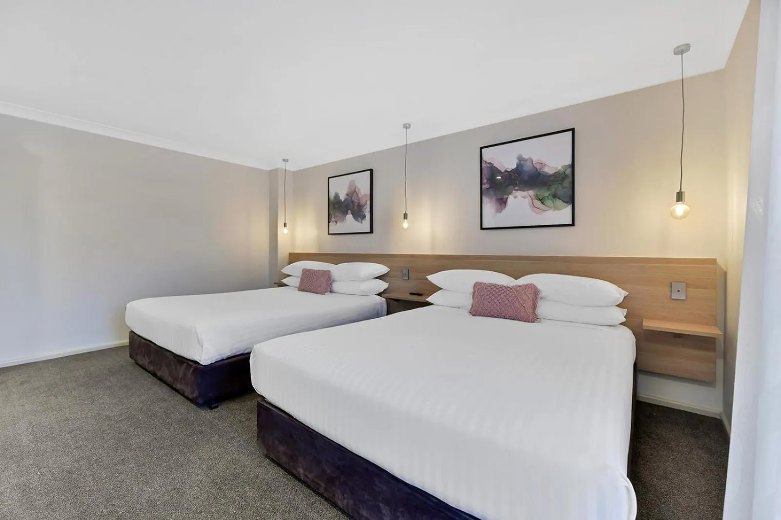 Bed in Central Caleula Motor Lodge