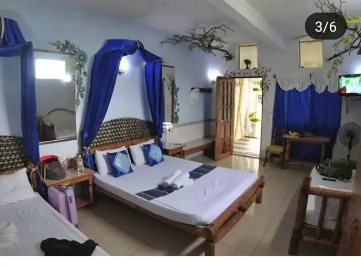 Economy Quadruple Room in Kokosnuss Garden Resort