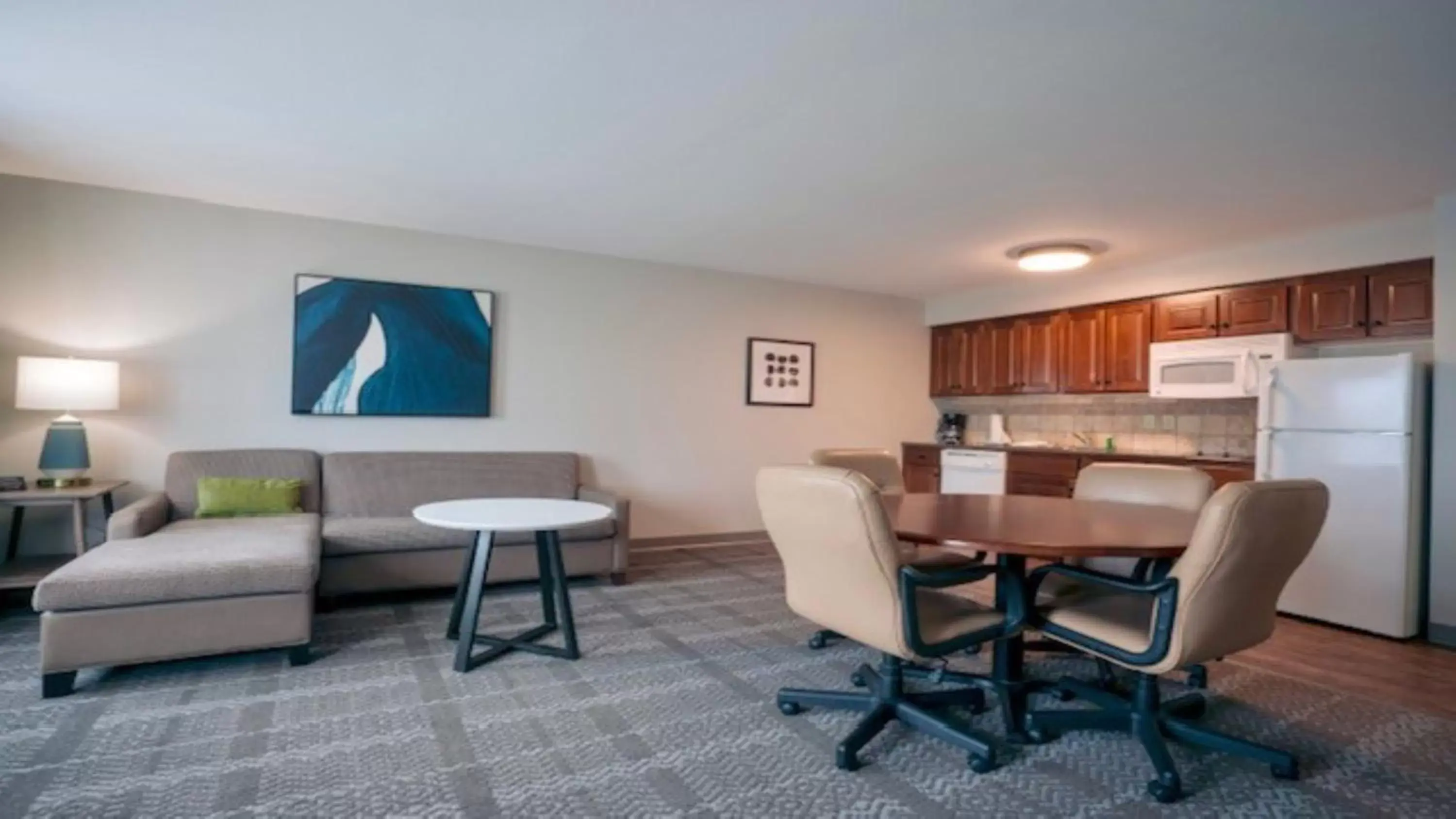 Bedroom, Seating Area in Staybridge Suites Akron-Stow-Cuyahoga Falls, an IHG Hotel