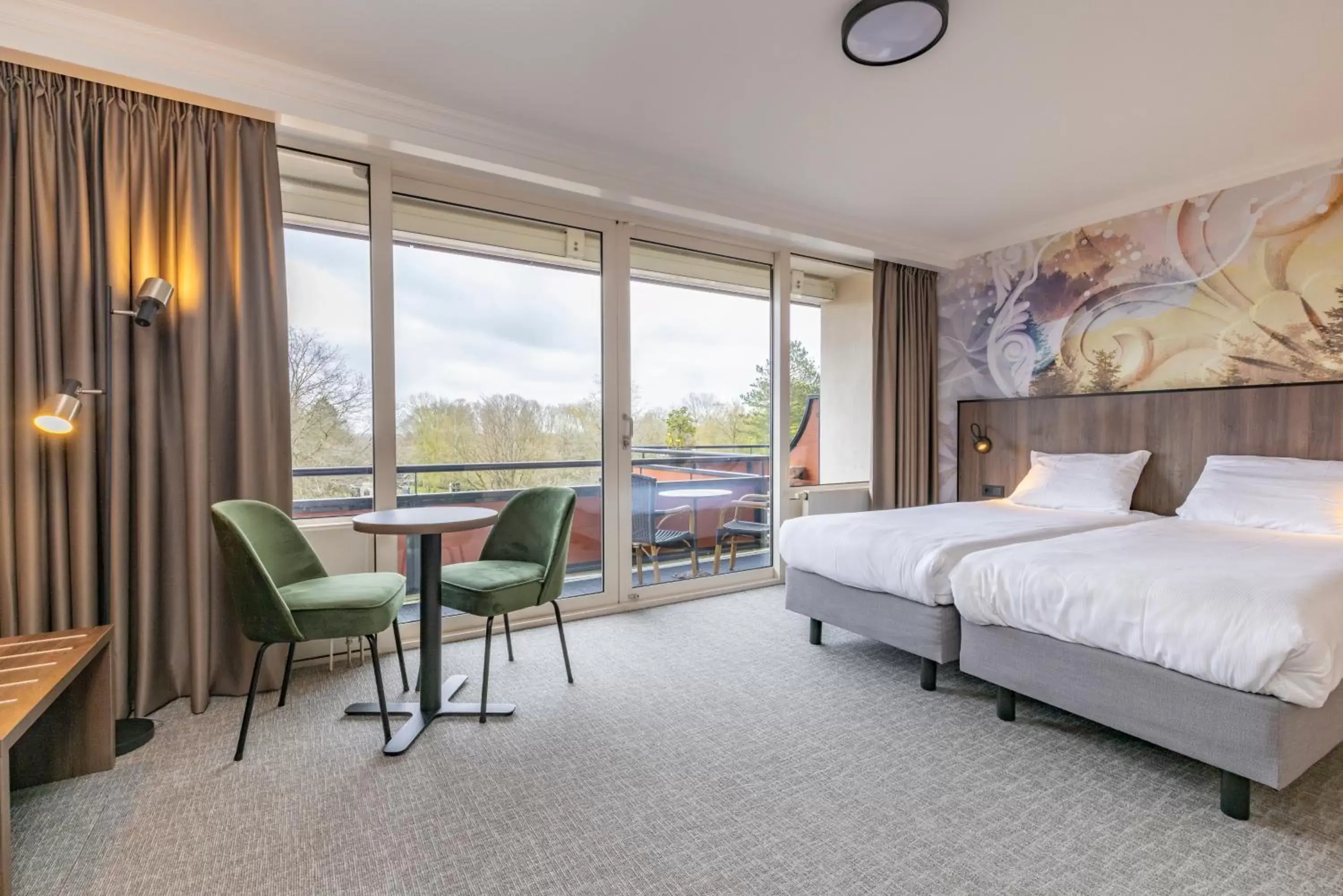 Bed in Fletcher Familiehotel De Hunzebergen