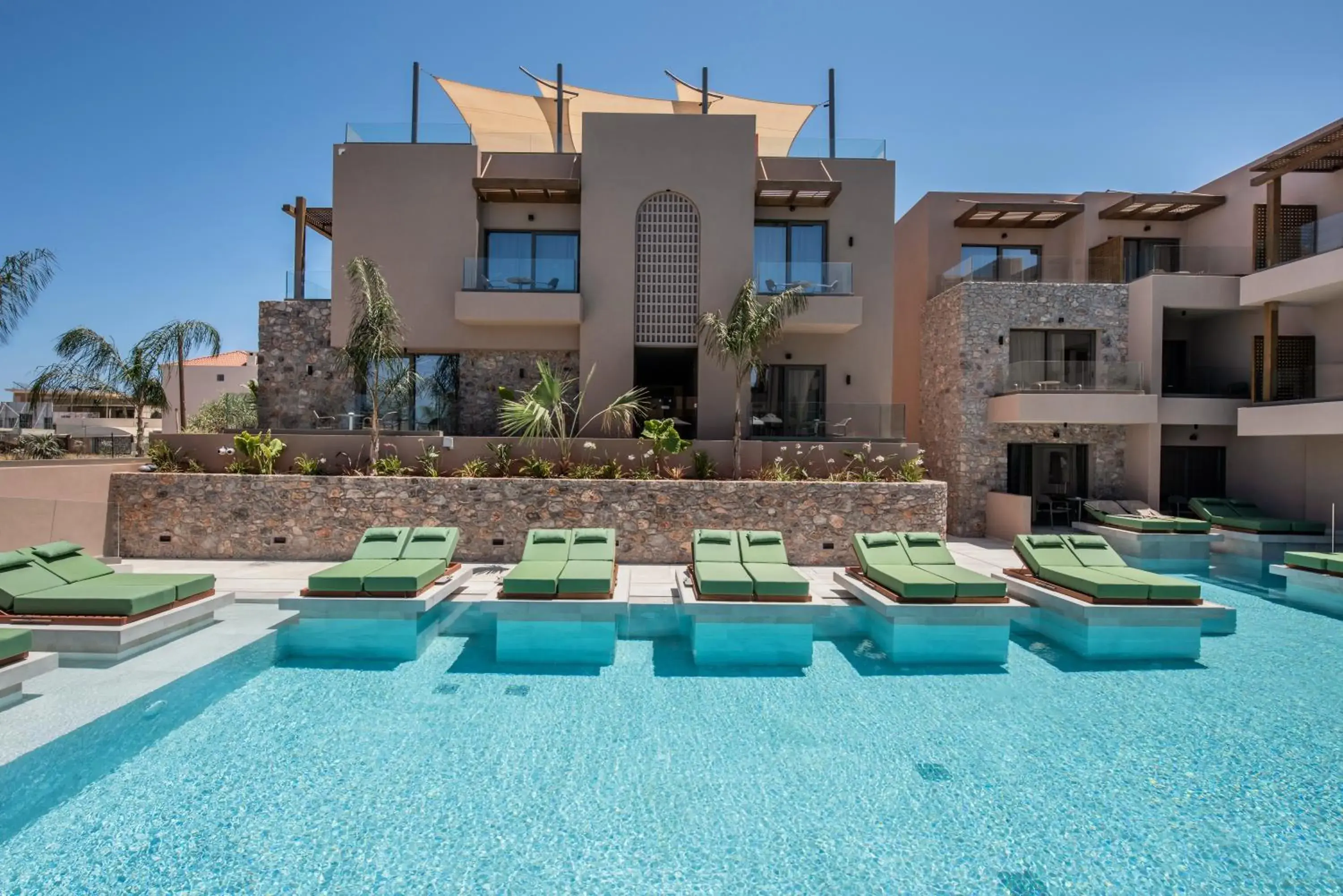 Swimming pool in Paralos Venus Suites Adults Only Swimming pool in Paralos Venus Suites Adults Only