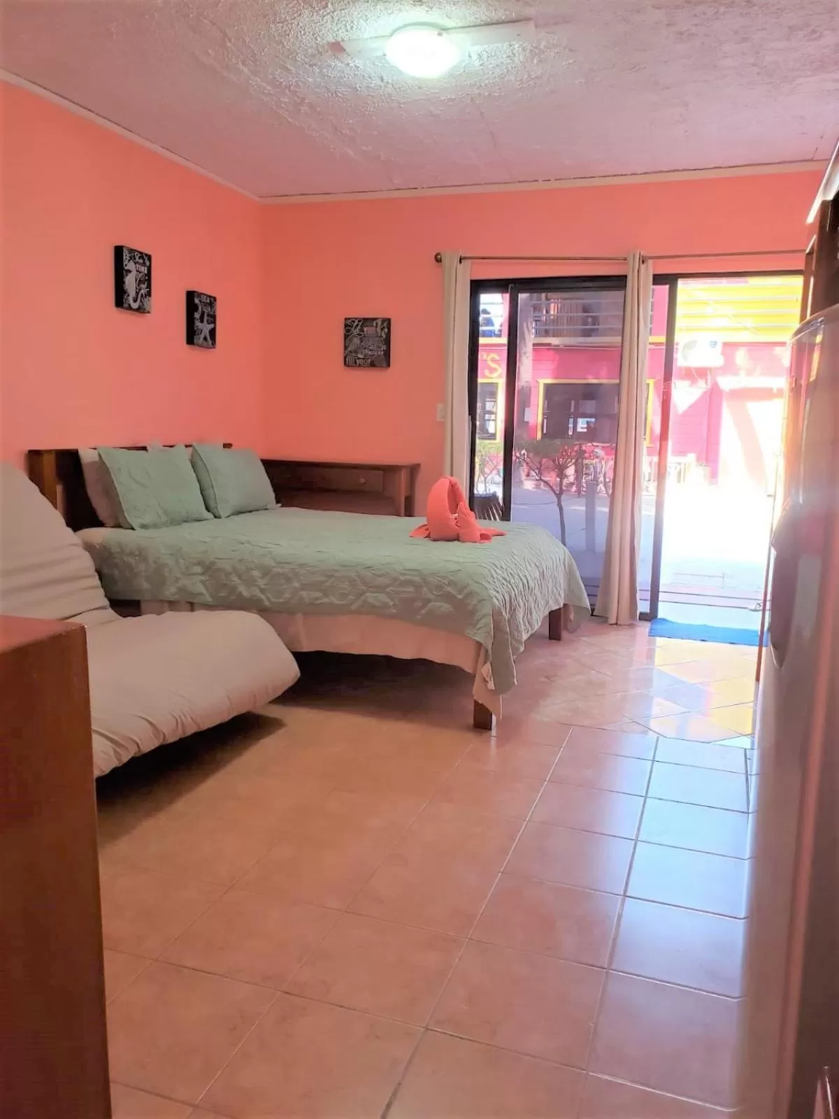 Bed in Beach Side Condos Caye Caulker by CCVH