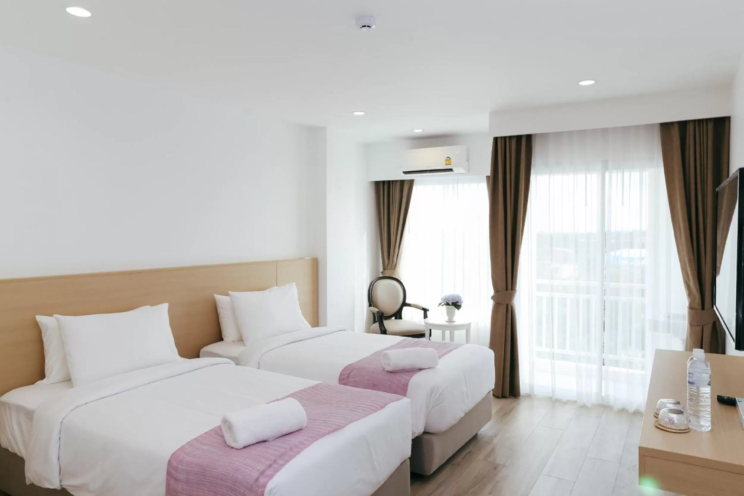 Bed in Arsh Boutique Hotel