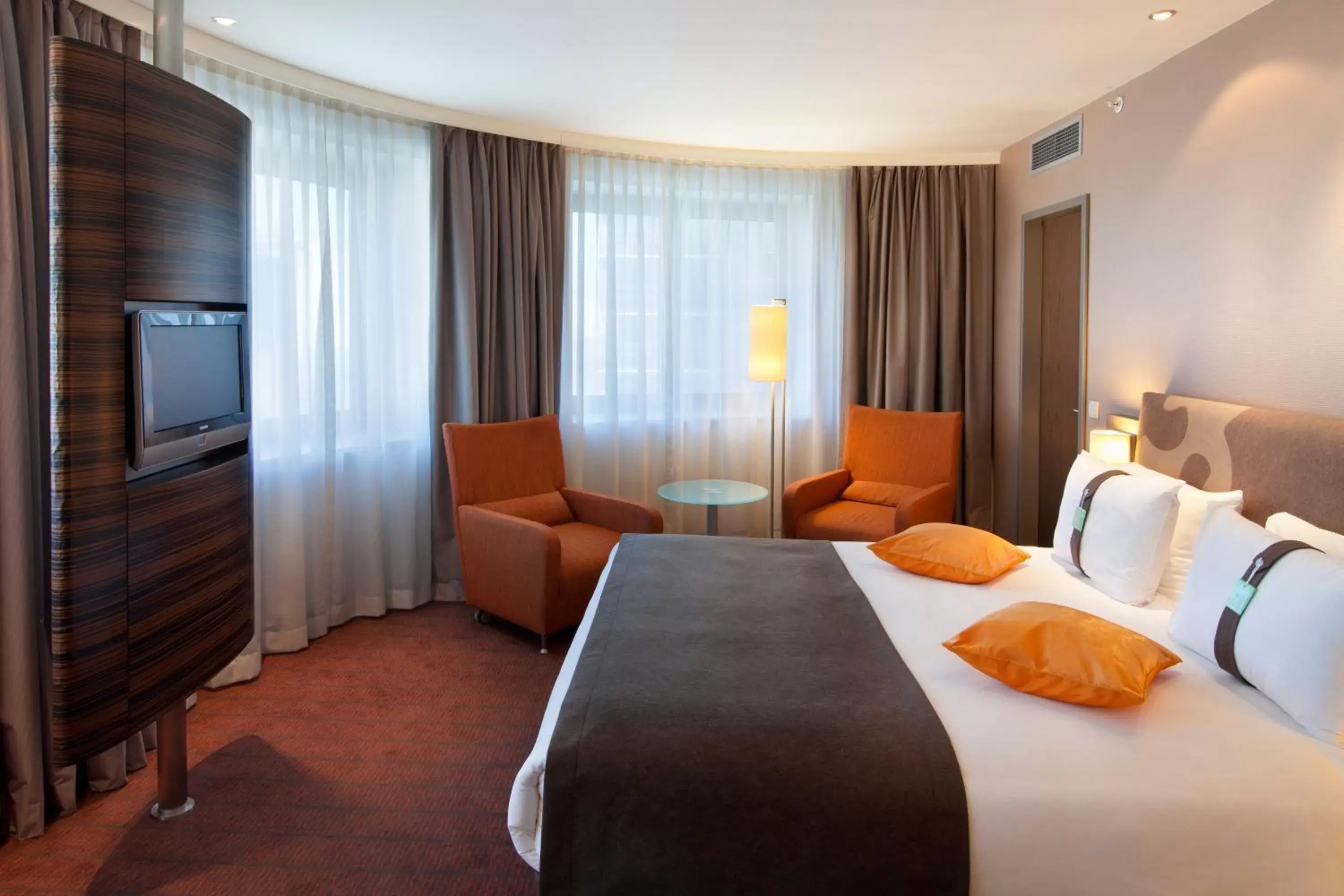 Bedroom in Holiday Inn Almaty, an IHG Hotel