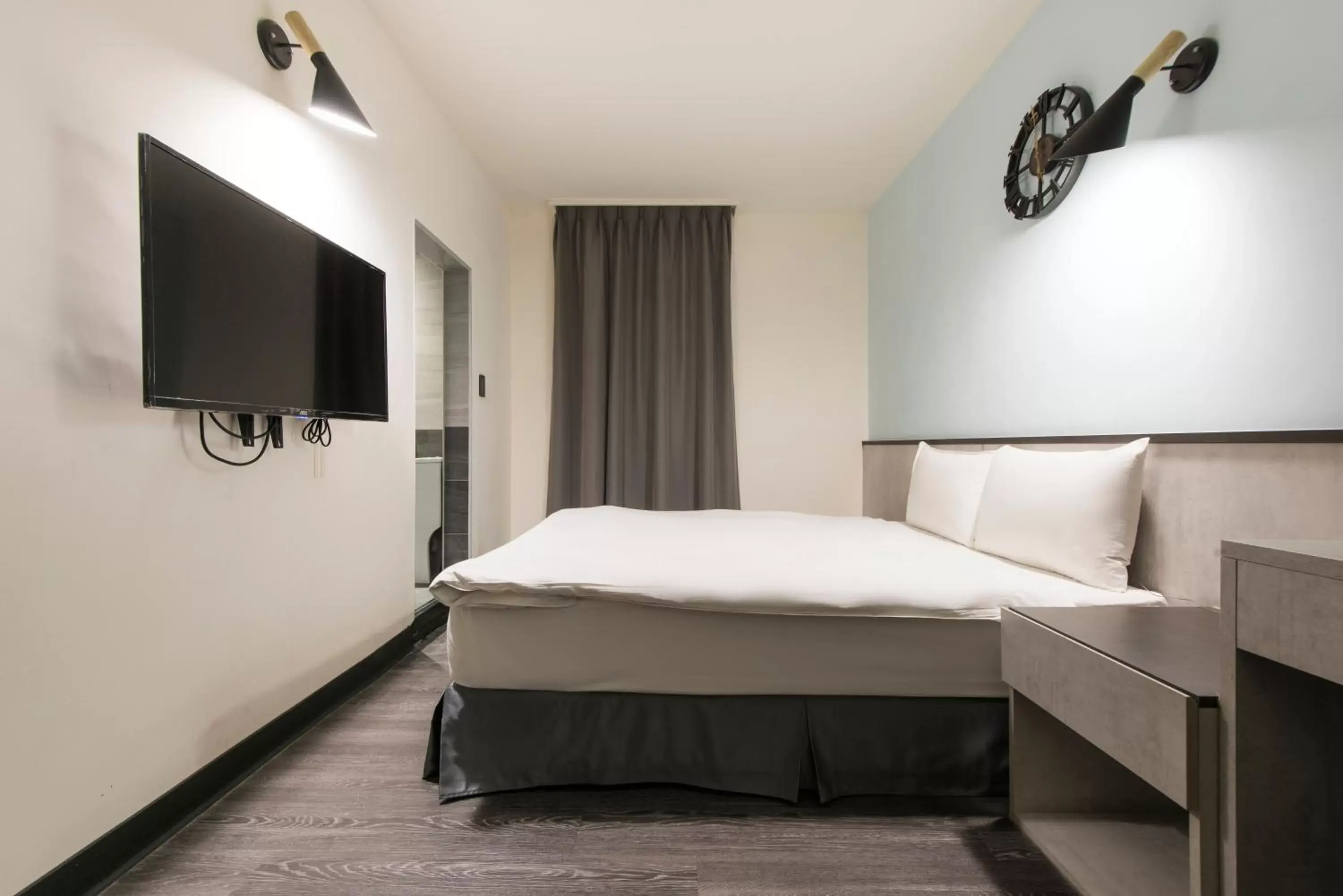 Bed in Raise Hotel Taichung